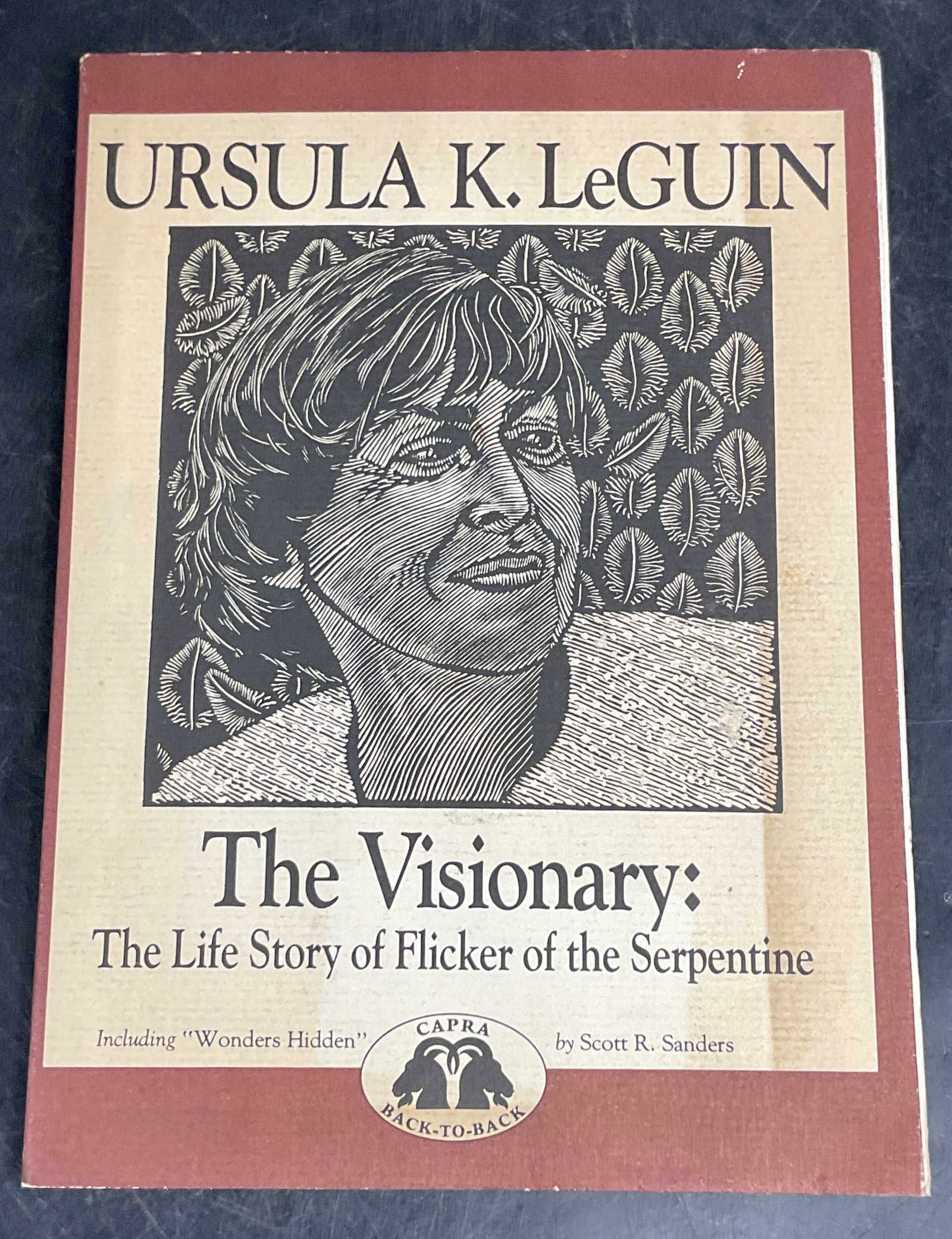 1984 Signed LeGuin/Sanders Back To Back Book: Softcover signed back to back copy of The Visionary The Life Story of Flicker of the Serpentine by Ursula K LeGuin and Wonder Hidden Audubons Early Years by Scott R Sanders. Capra Press, 1984. Signed 