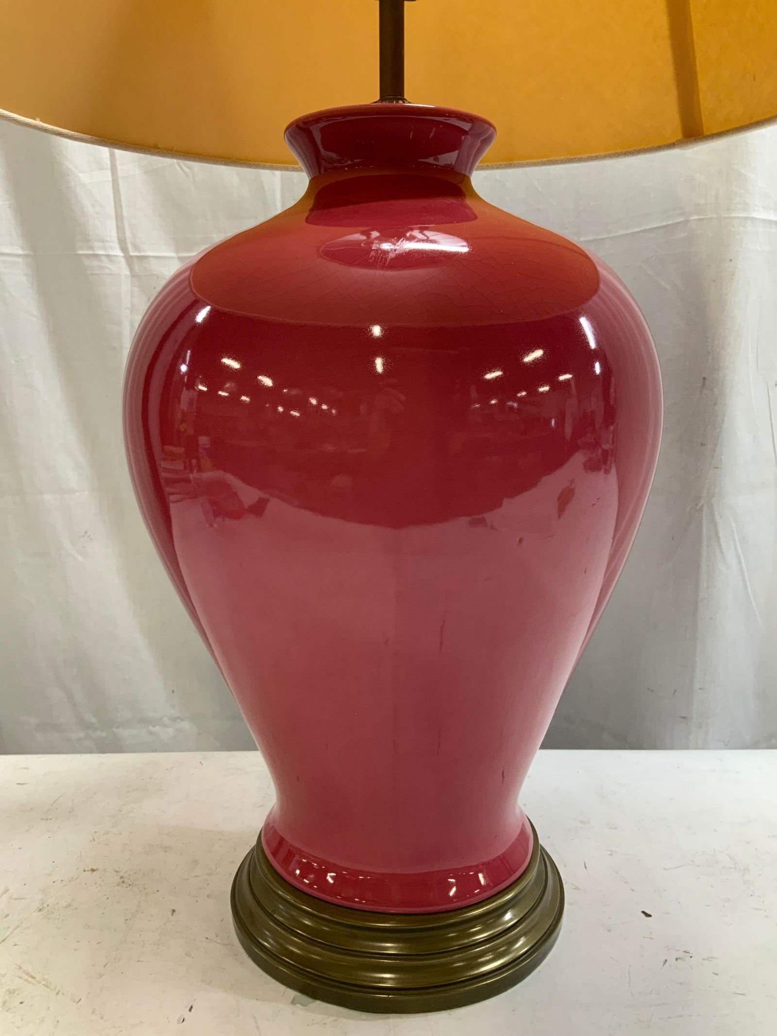 Vtg Brass & Pink Ceramic Table Lamp: Vintage table features a pink ceramic body & brass base. Comes with a white fabric shade. Table lamp has not been tested for function. Lot is sold as is. Surface wear consistent to age, use & exposure