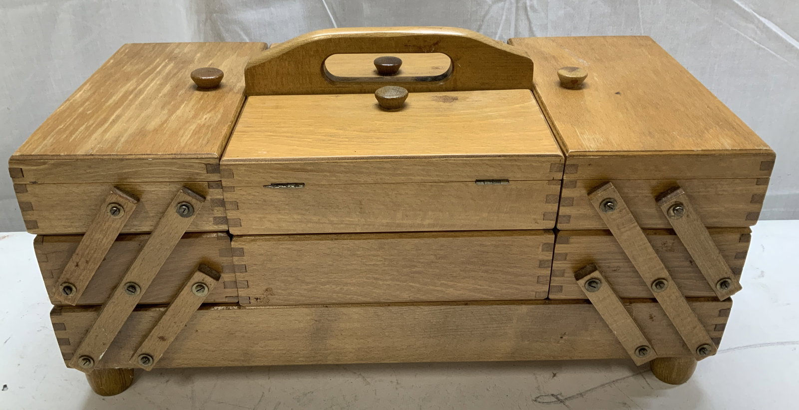 Vtg Accordion Style Wooden Storage Bx ROMANIA: Vintage accordion-style wooden box featuring multiple compartments for storage. Fold out design. Brown toned. Signed & marked on underside. Reads, MADE IN ROMANIA. Surface wear consistent to age, use 