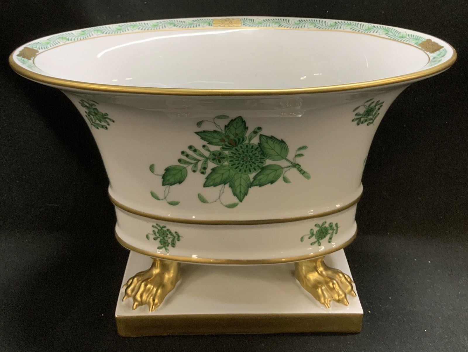 Herend Hungary Hand Painted Apponyi Green Vase: Vase Herend porcelain vase features hand painted green floral motifs & gilt paw feet. Rectangular base with heavy gilt accents. Glossy finish. Signed & marked on underside. Reads, HEREND HUNGARY. HAND