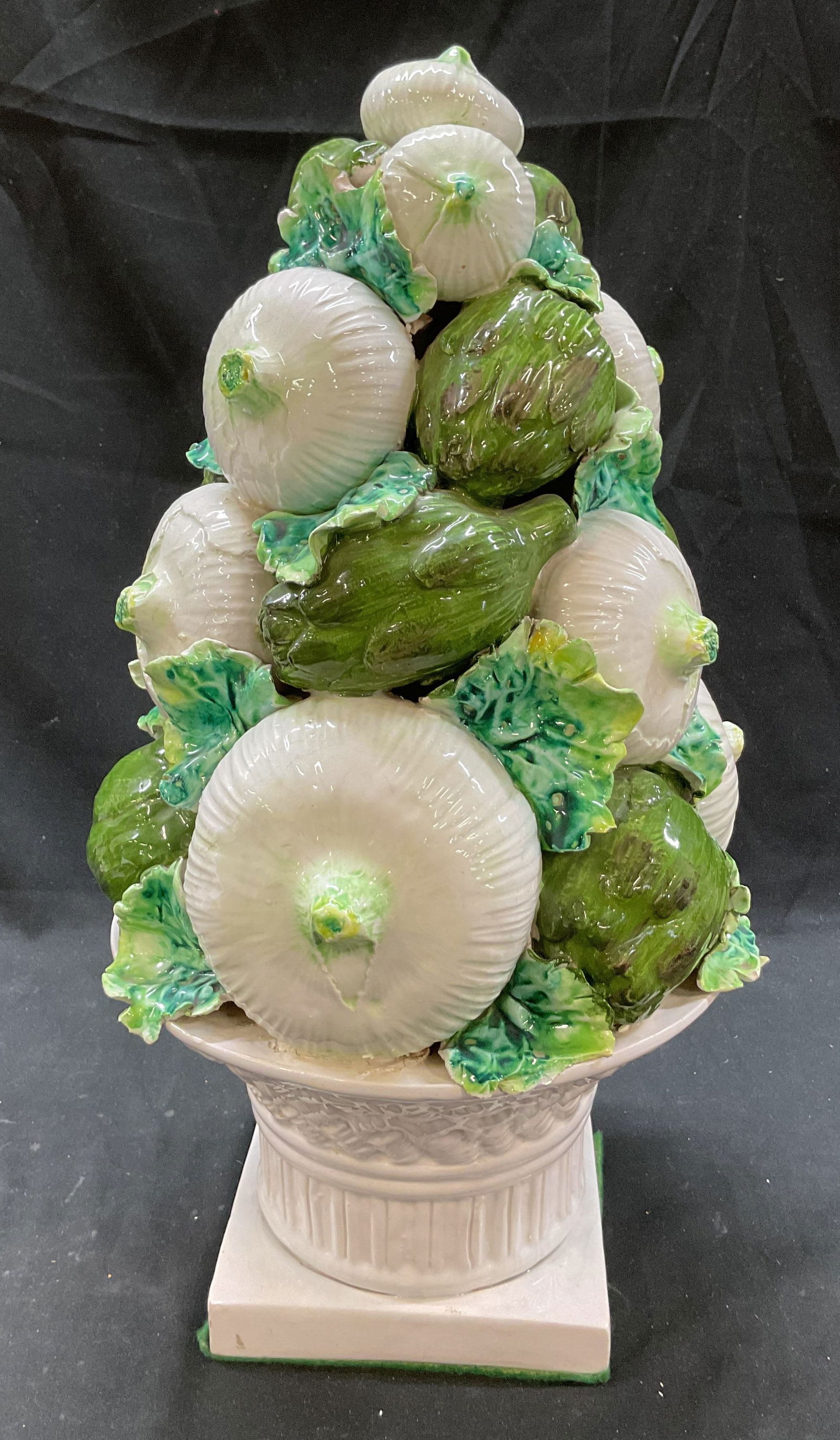 Hand Painted Ceramic Majolica Vegetable Sculpture: Vintage hand painted ceramic majolica vegetable sculpture. Glossy finish. Vegetable motifs overlapping one another. Sit in white tazza form pedestal base. Hand painted in varying colors. Detailed feat