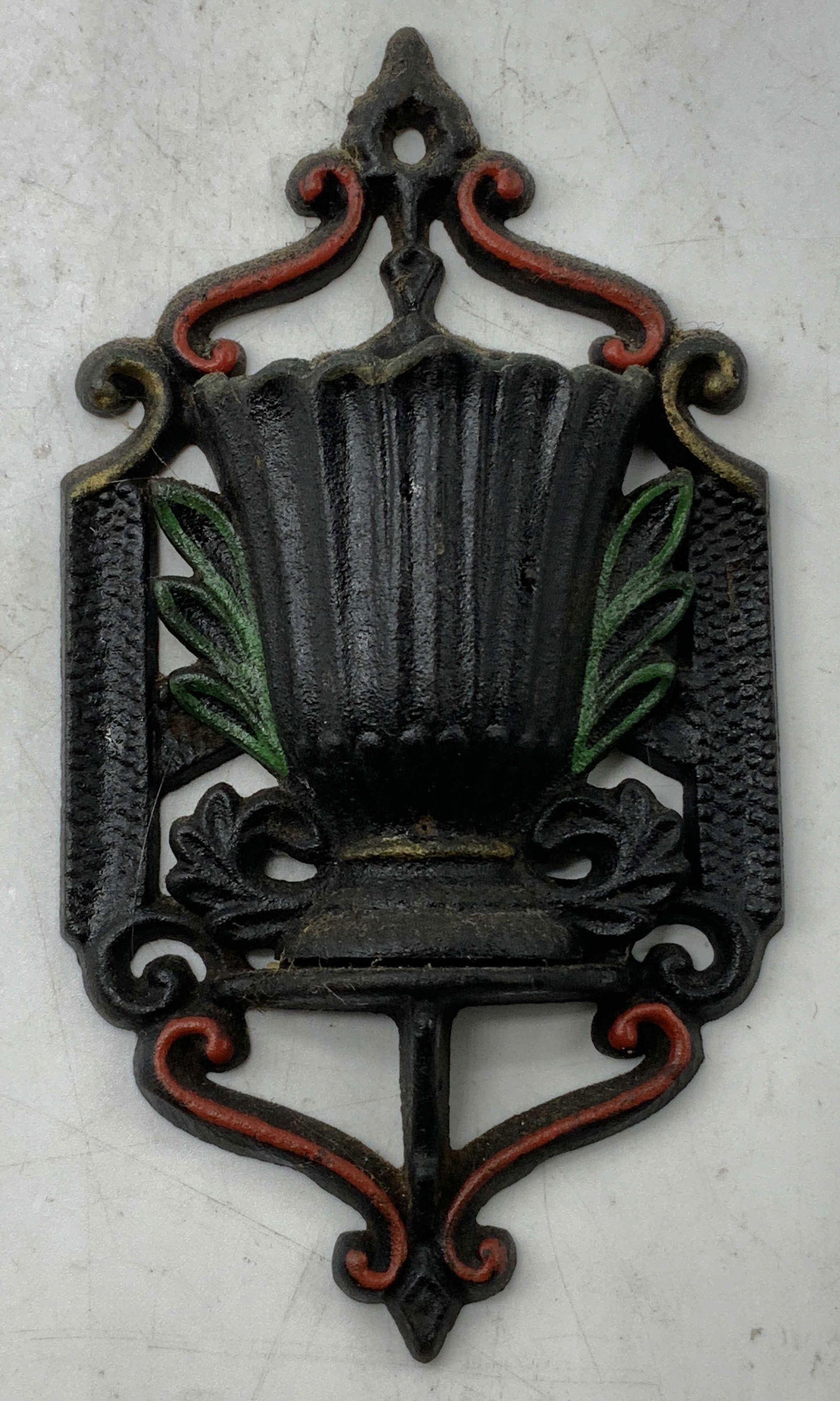 Vtg Wilton Cast Iron Matchstick Holder: Vintage Wilton cast iron matchstick holder. Features an ornate design & hand painted accents. Red, yellow & green. Signed & marked on underside. Reads, WILTON 6. Surface wear consistent to age,