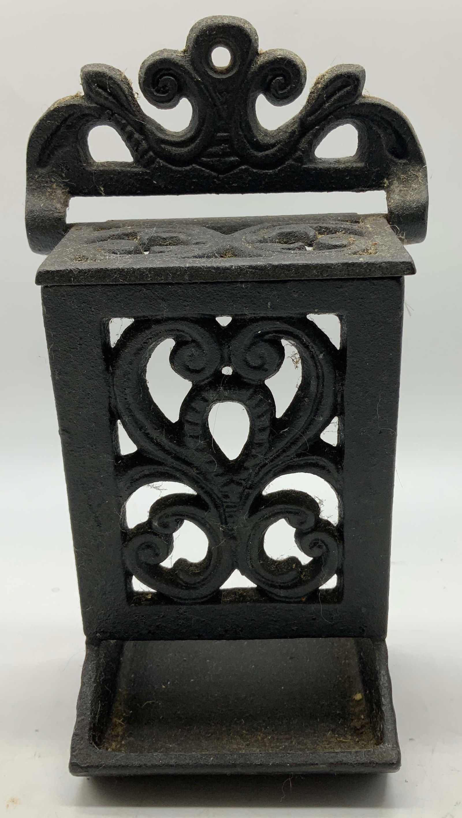 Vtg Cast Iron Wall Ornate Match Holder: Vintage cast iron wall-mounted match holder, featuring ornate style scrollwork. Designed to hold a box of matches. Surface wear consistent to age, use & exposure. Signed & marked. Reads, D.M.H.