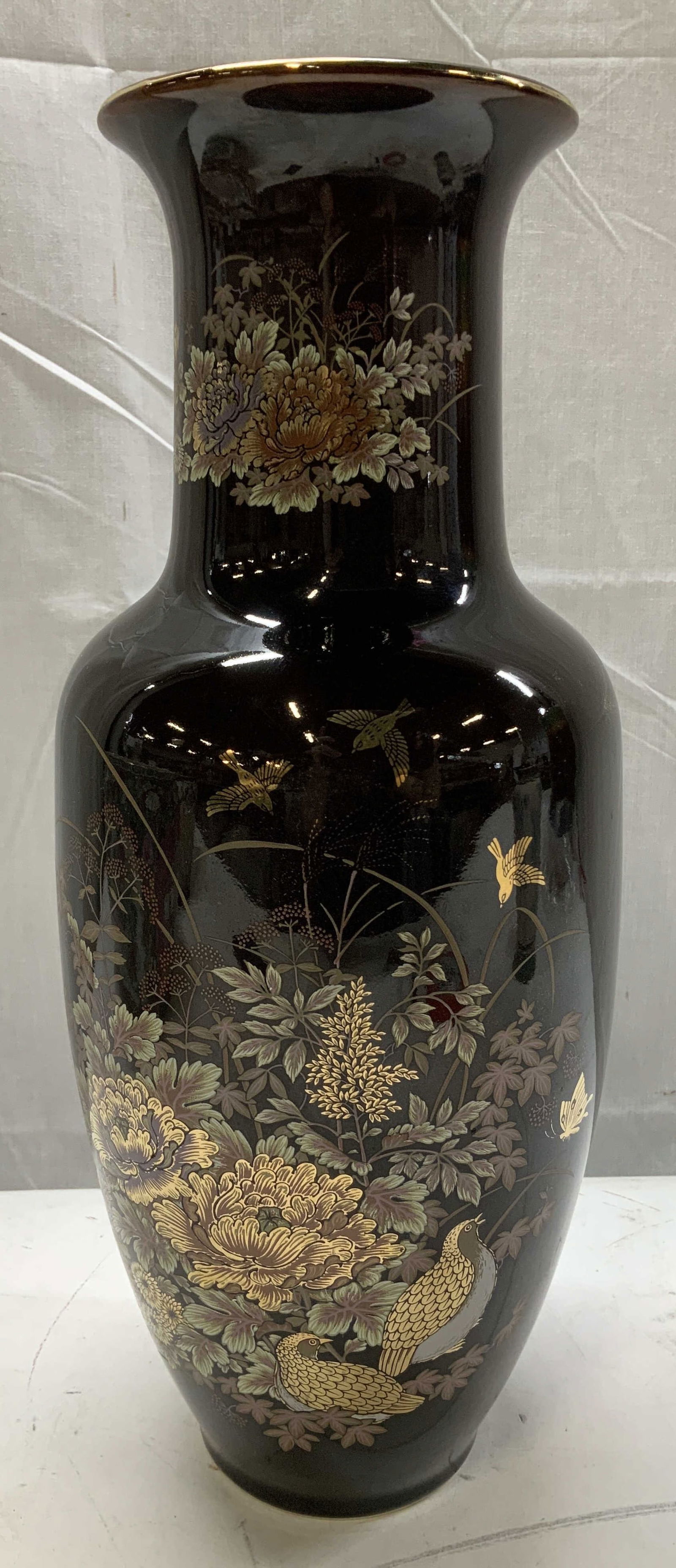 Asahi Gilt Floral & Bird Motif Porc Vase JAPAN: Vintage porcelain vase features gilt floral, bird & butterfly motifs. Dark toned background. Baluster shape & flared rim. Signed & marked on underside. Reads, ASAHI JAPAN. Surface wear consistent to a