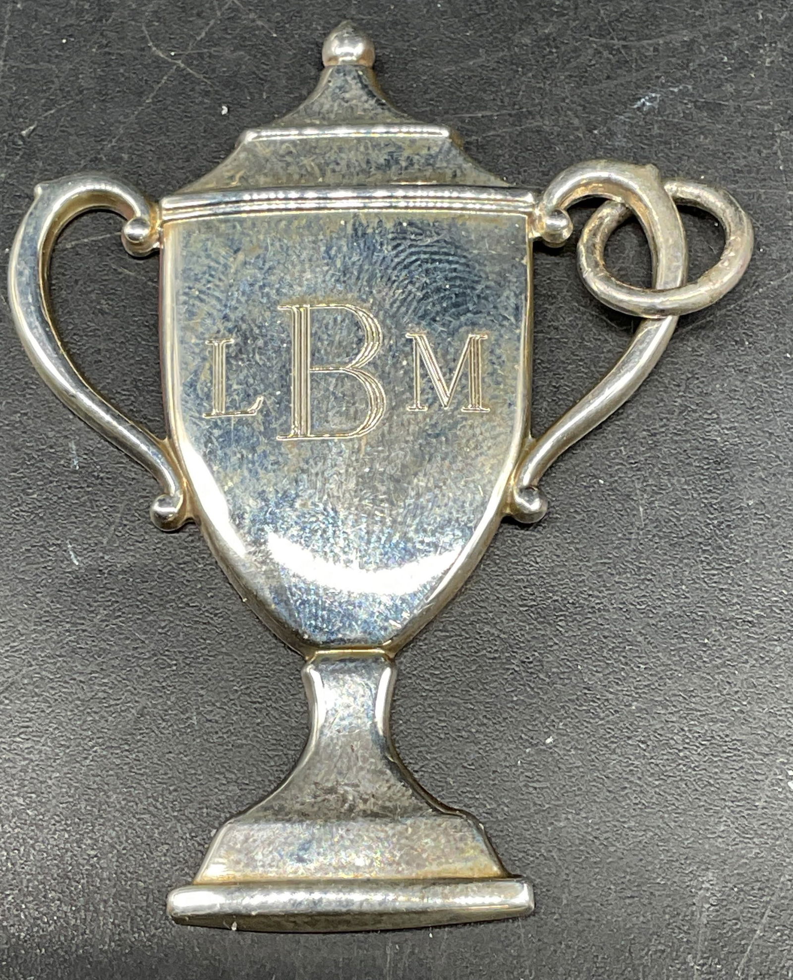 Tiffany & Co Sterling Silver Urn Pendant: Signed Tiffany & Co Sterling silver urn pendant. Engraved monogram. Measures approx. 1.75 x 1.25 inches. Marked sterling. Total weight 11 grams. Some scratching. Jewelry, estate jewelry, fine jewelry,