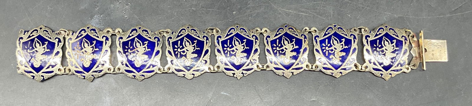 Vintage Sterling Silver Thai Enamel Bracelet: Vintage sterling silver Thai dancer panel bracelet with blue enamel. Measures approx. 7 inches long. Total weight 19.7 grams. Marked sterling, Siam. Some scratching. Jewelry, estate jewelry, fine jewe