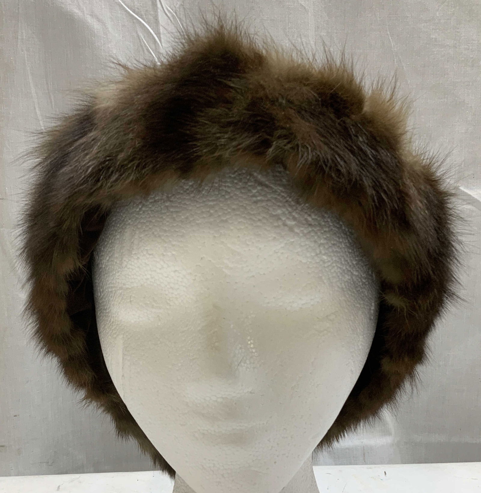 Vtg Brown Mink Fur Headband: Vintage brown mink headband features a velvet backing. Brown toned. No visible signature or markings. Surface wear consistent to age, use & exposure. Measurements: Length 27in x width 3.3in. Vintage b