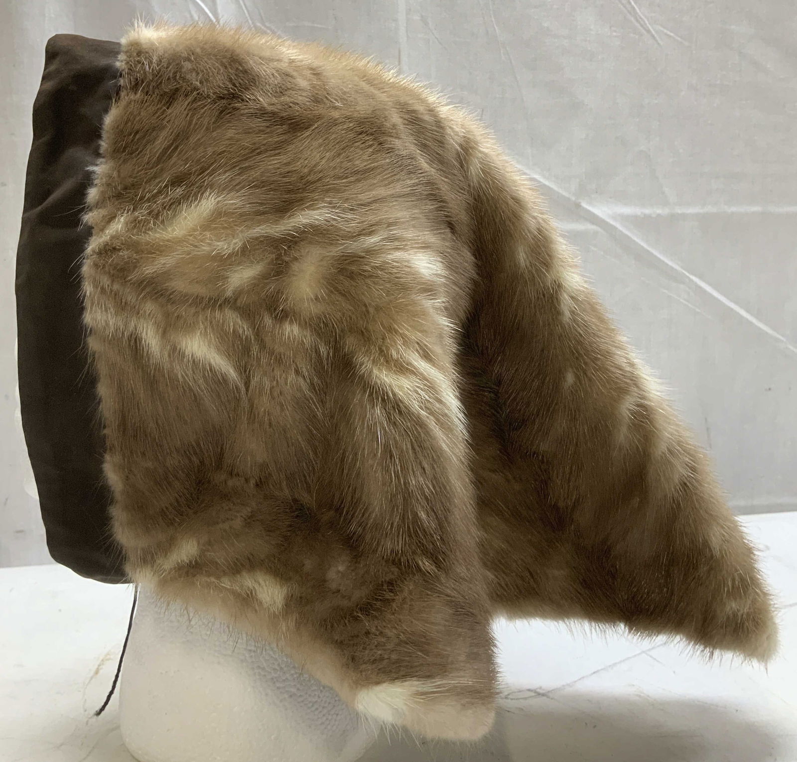 Vntg Emme Mink Fur Head Wrap: Vintage Emme mink fur head wrap is light brown toned & features a brown trim. Underside features black buttons. Signed & marked. Reads, EMME. Surface wear consistent to age, use & exposure. Measuremen