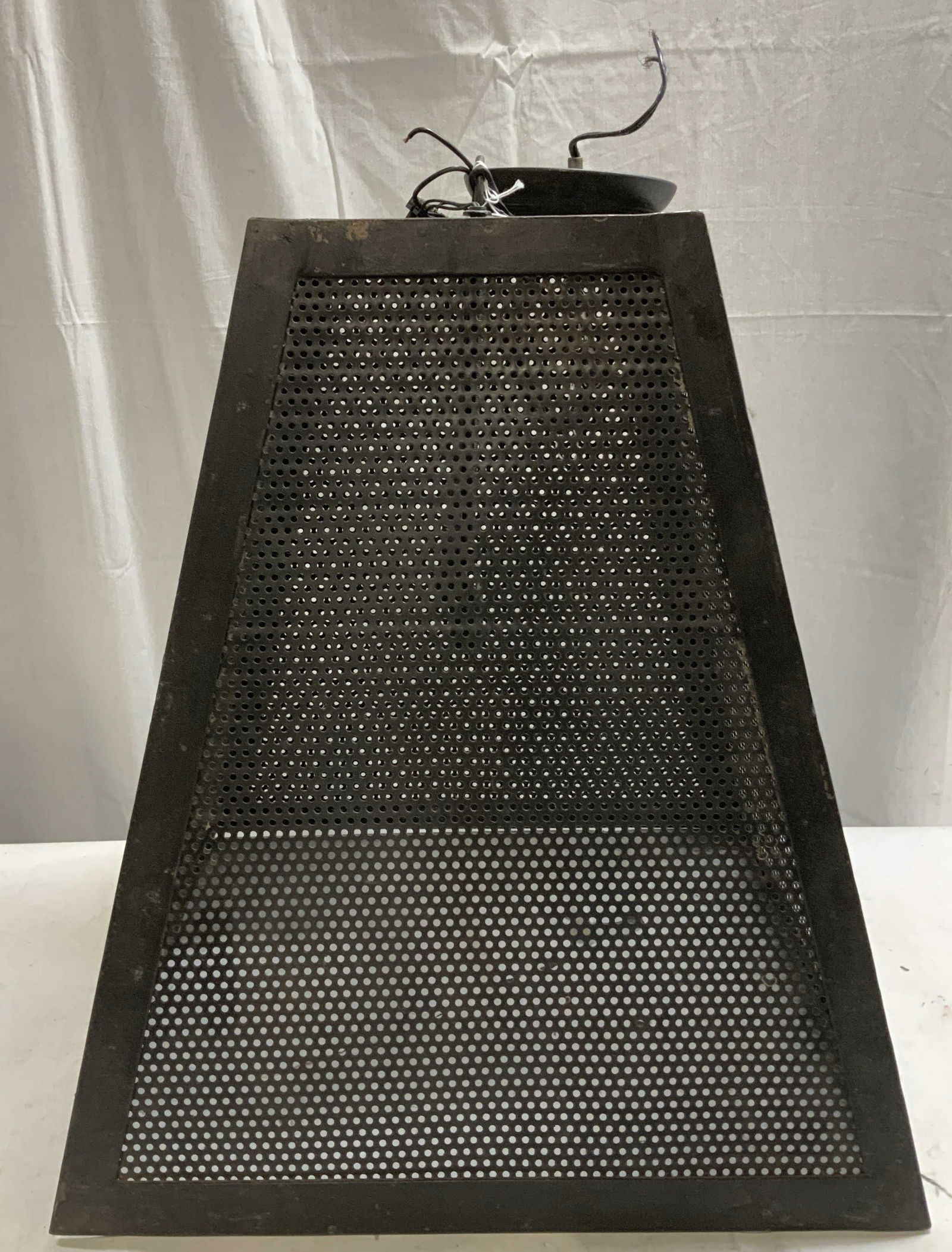 Large Vtg Cast Iron Light Fixture 20.5in: Vintage cast iron light fixture features a trapezoidal shape & shade features circle accents. Surface wear consistent to age, use & exposure. Lot is sold as is. Measurements: length 18in x width 18in
