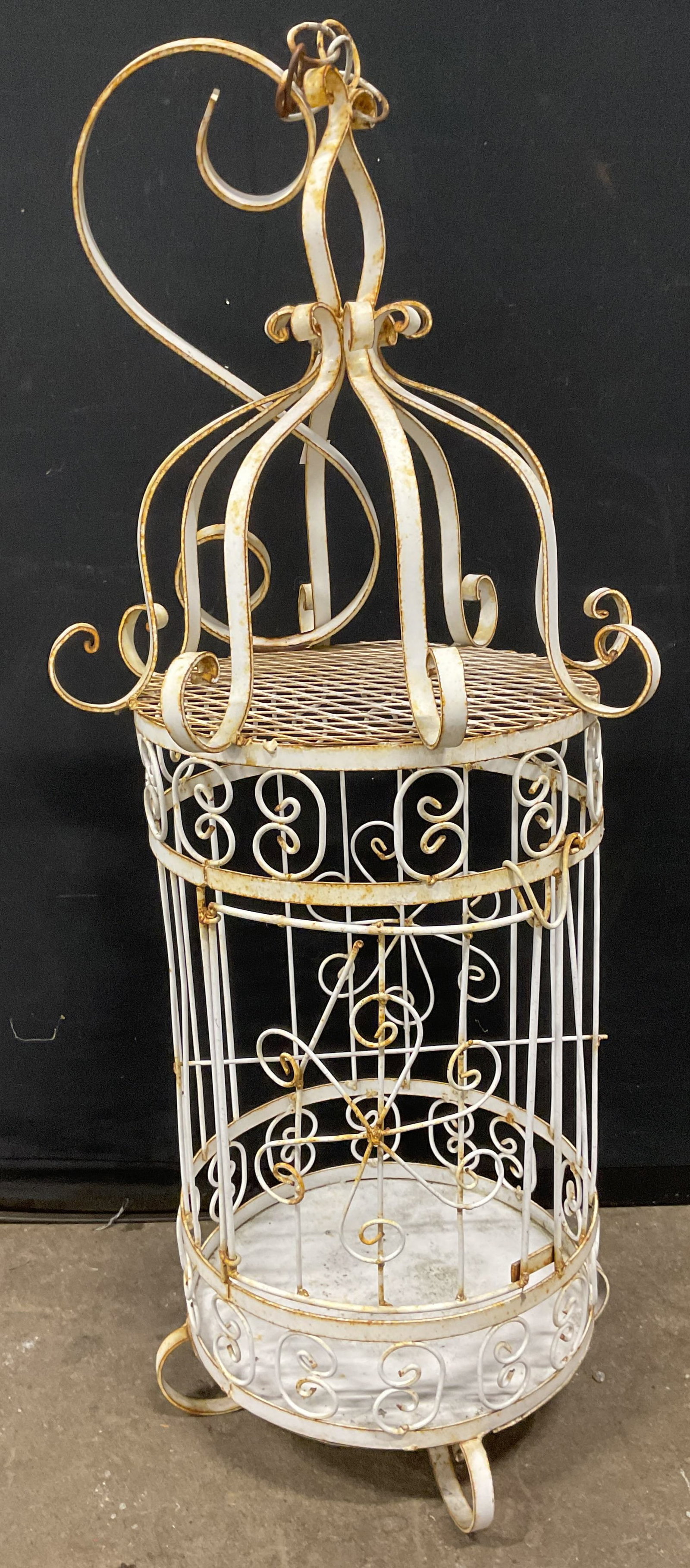 Antique White Iron Wire Scroll Birdcage 32in: Antique white iron scroll wire frame birdcage. Measures approx. 14 x 32 inches. Wear including patina, scratching, warping, loss to paint. Door frame needs repair. Birdcage, antique birdcage, white