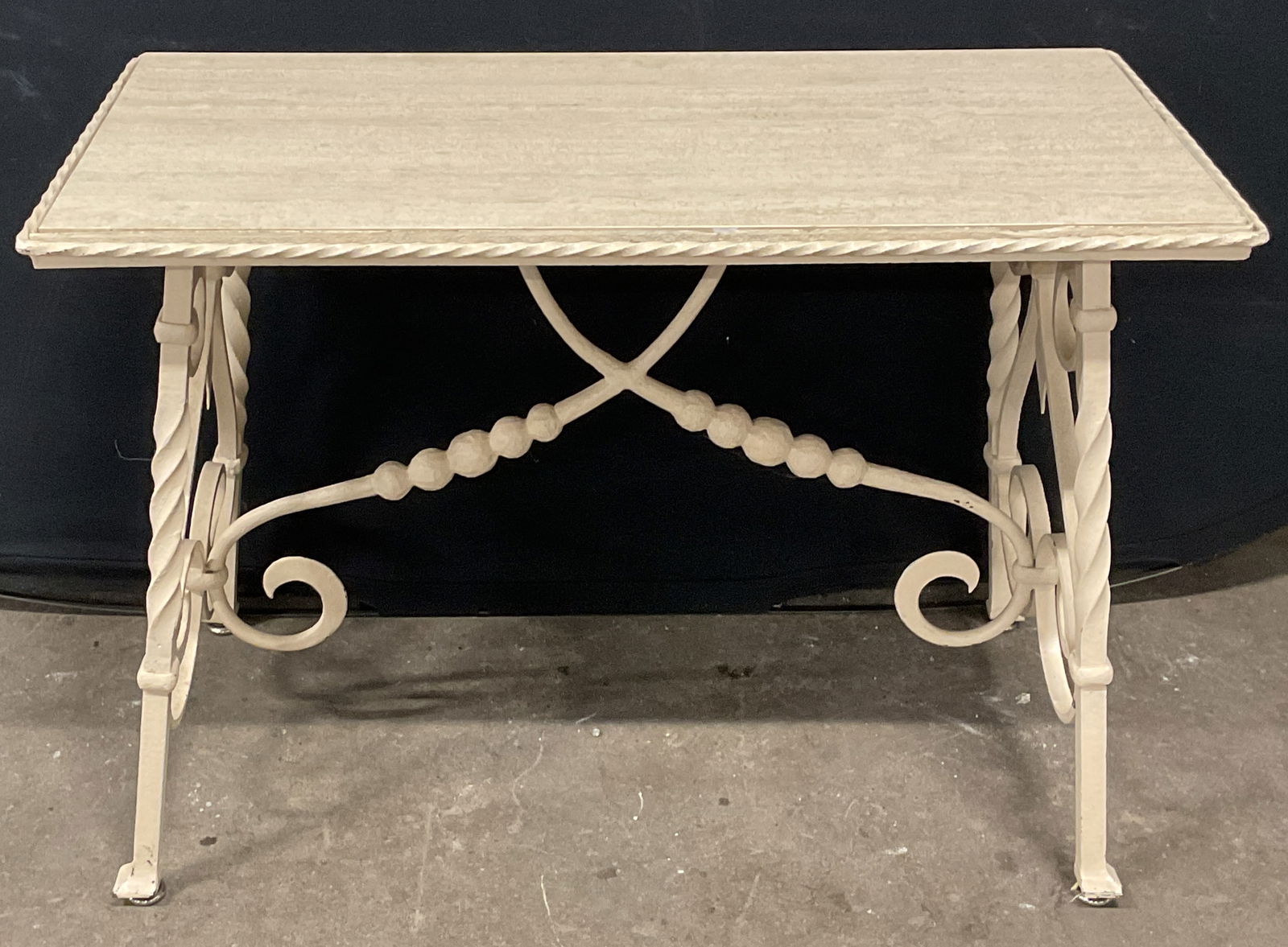 Vtg French Style Iron & Marble Scroll Side Table: Vintage French style cream iron scroll frame side table with beige marble top. Measures approx. 31.5 x 16.5 x 21.5 inches. Wear including scratching and loss to paint. French style table, side