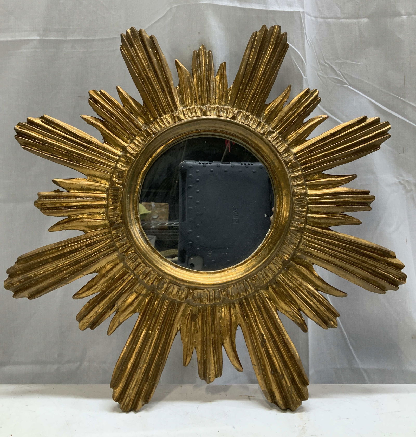 Vtg Handmade Giltwood Wall Mirror ITALY: Vintage handmade Giltwood wall mirror featuring a sunburst style. Underside has a red velvet backing. Signed & marked on underside. Reads, HAND MADE IN ITALY. ITALIA. Surface wear consistent to age, u