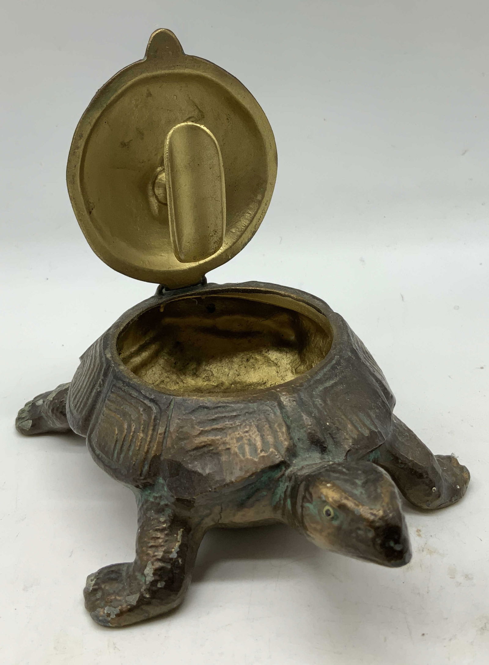 Vtg Brass Hinged Turtle Ashtray AUSTRIA: Vintage brass turtle ashtray featuring a hinged shell lid. Shell opens to reveals a cigar rest. Signed & marked on underside. Reads, MADE IN AUSTRIA. Surface wear consistent to age, use & exposure. Me