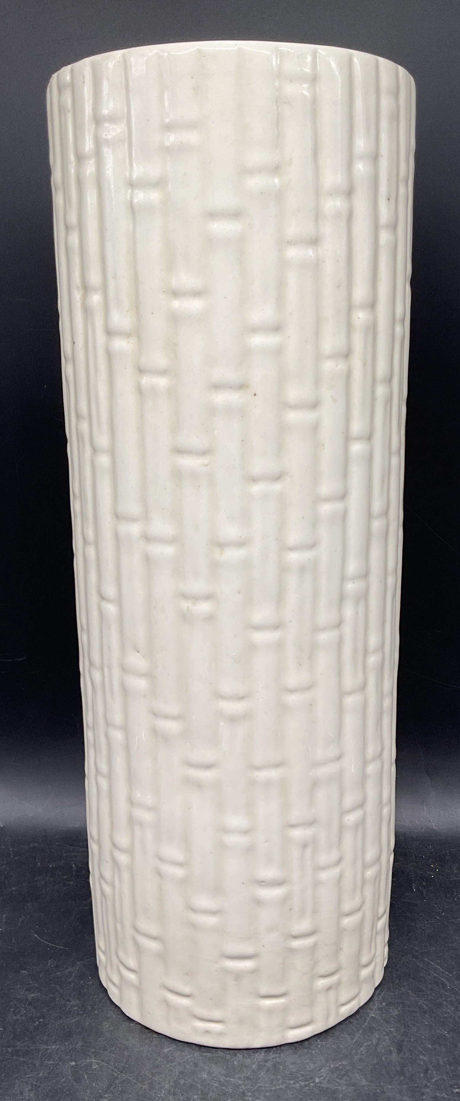 Vntg Ceramic White Bamboo Umbrella Stand 16.25in: Vintage white ceramic umbrella stand or vase with bamboo motif. Measures approx. 6 x 16.25 inches. Some wear including scratching and crazing. Umbrella stand, vase, bamboo motif umbrella stand, bamboo