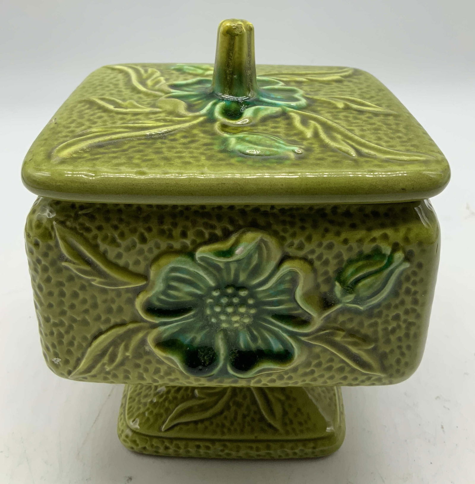 Vtg Royal Sealy Pedestal Lidded Vessel JAPAN: Vintage Royal Sealy lidded vessel features raised floral & leaf motifs. Green glossy finish. Pedestal base. Ceramic material. Signed & marked on underside. Reads, Royal Seal Quality Imports