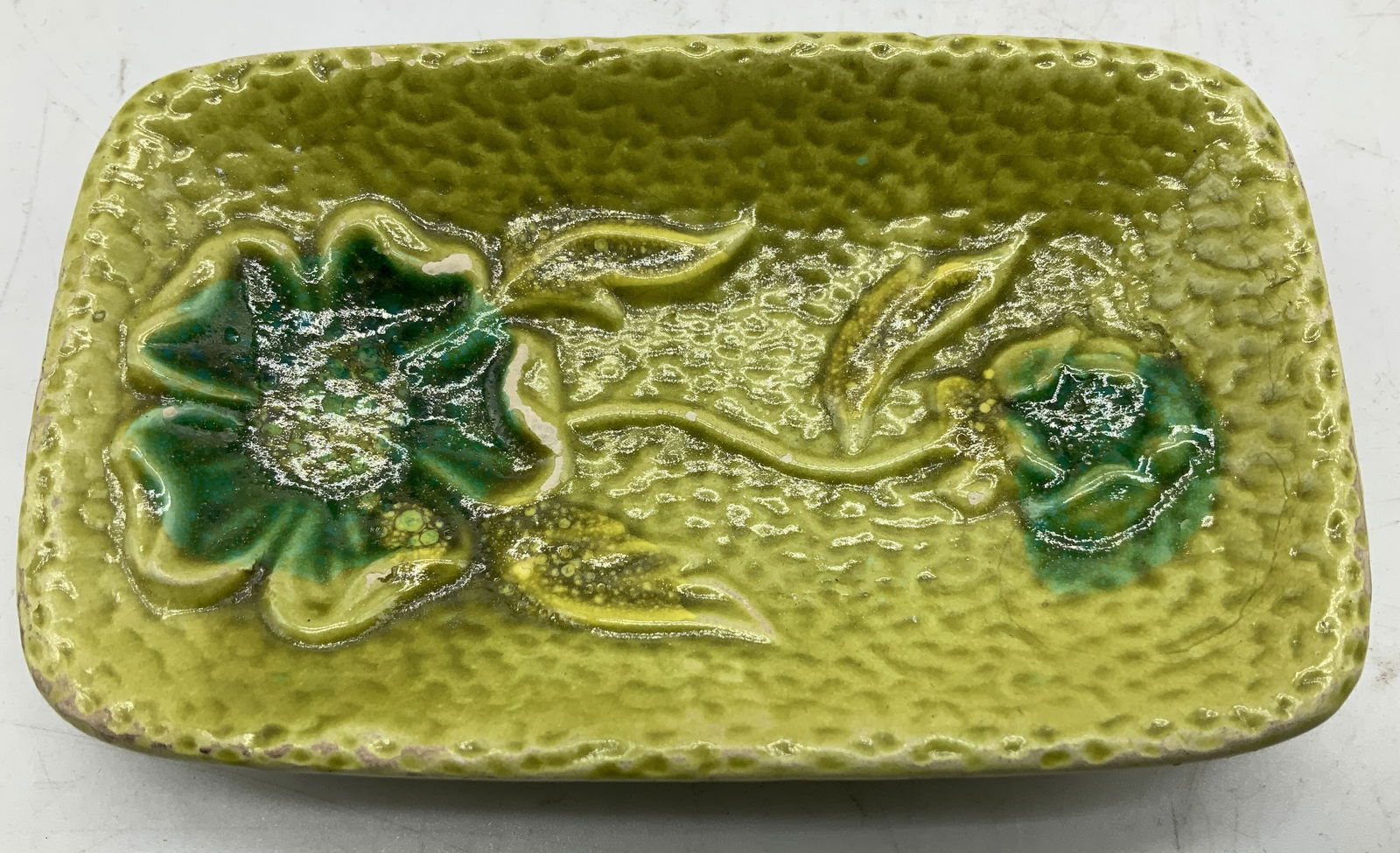 Vtg Green Ceramic Floral Trinket Dish: Vintage green ceramic floral trinket dish, features a rectangular shape & glossy finish. No visible signature or markings. Surface wear consistent to age, use & exposure. Measurements: length 4.3