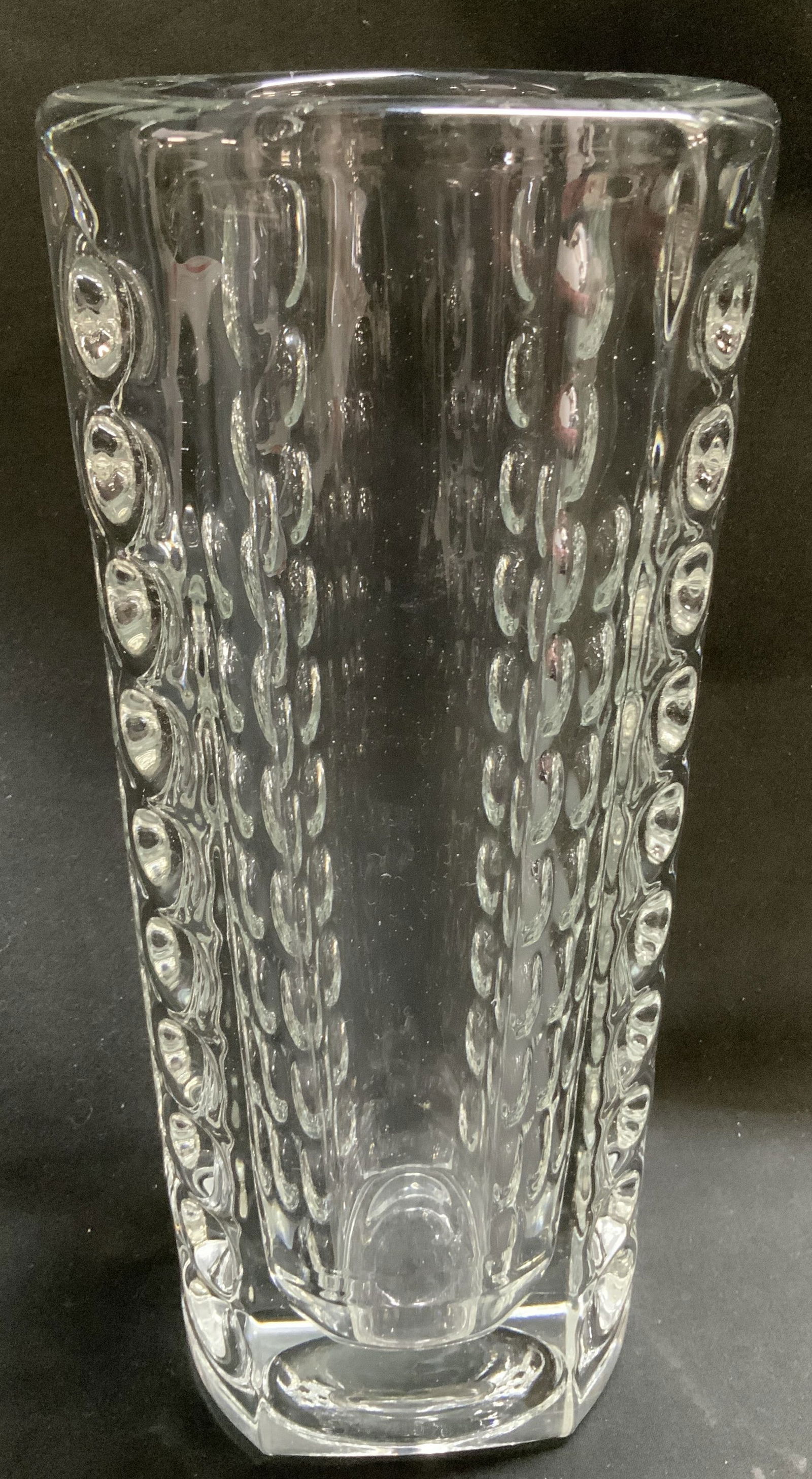 C.1960s Pressed Thumbprint Glass Vase 9.7in: Circa 1960s glass vase features thick glass & a thumbprint texture on sides. Vase has some weight. No visible signature or markings. Surface wear consistent to age, use & exposure. Measurements:
