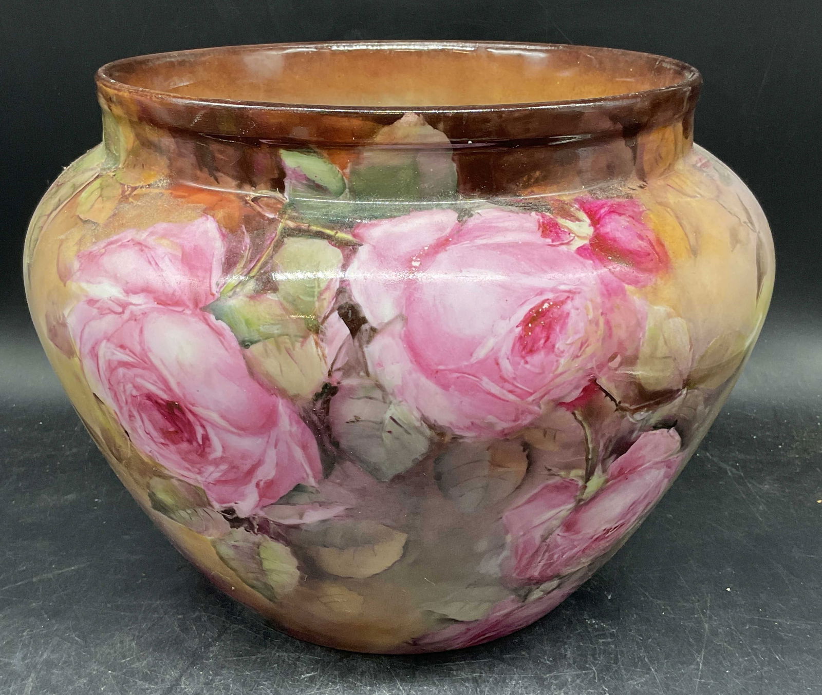 Vintage Limoges Porcelain Floral Jardiniere France: Vintage signed Limoges porcelain jardiniere planter. Hand painted floral motif. Made in France. Measures approx. 11 x 8.5 inches. Some scratching and loss to pigments. Limoges jardiniere, Limoges