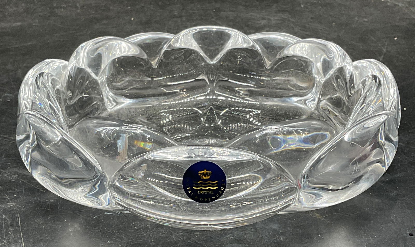 Royal Copenhagen Crystal Heart Bowl: Signed Royal Copenhagen crystal heart motif bowl. Raised scalloped heart design. Measures approx. 6.75 x 2.25 inches. Some scratching. Royal Copenhagen bowl, Royal Copenhagen crystal, crystal