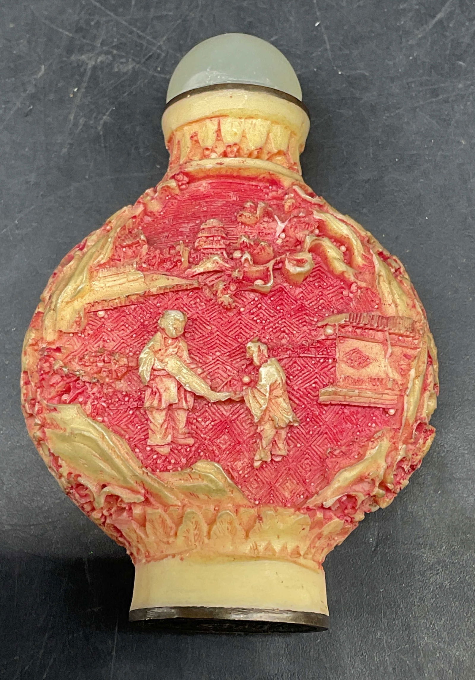 Vtg Signed Chinese Carved Resin Snuff Bottle: Vintage signed Chinese snuff bottle. Carved resin with red lacquer. Traditional figural scenes. Semiprecious stone lid. Interior not examined. Measures approx. 2.5 x 2 inches. Wear including