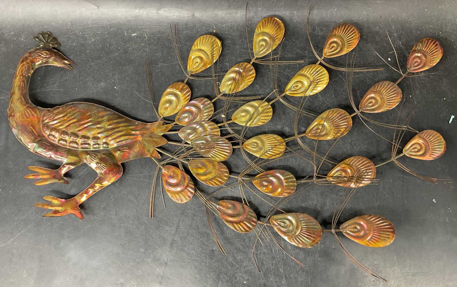 Vintage Metal Peacock Wall Sculpture: Vintage metal peacock wall sculpture. Measures approx. 17 x 11 inches. Wear including patina, scratching, warping. Peacock wall sculpture, peacock wall hanging, metal peacock, home decor, home accesso