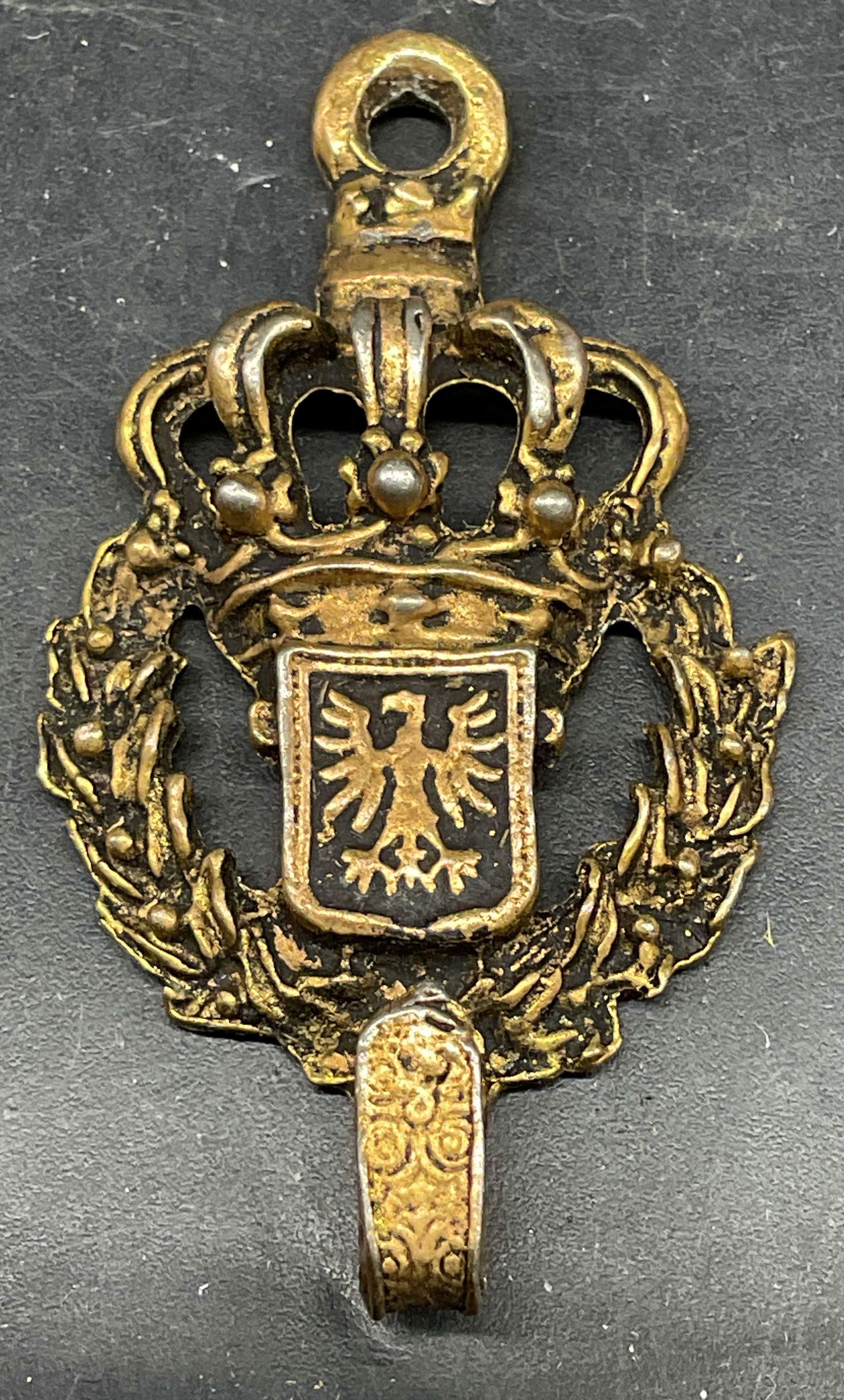 1963 James Papalia Heraldic Eagle Wall Hook: Vintage 1963 signed James Papalia brass wall hook with crown and heraldic eagle coat of arms. Measures approx. 2 x 1 inches. Some scratching and patina. James Papalia wall hook, brass wall hook, crown