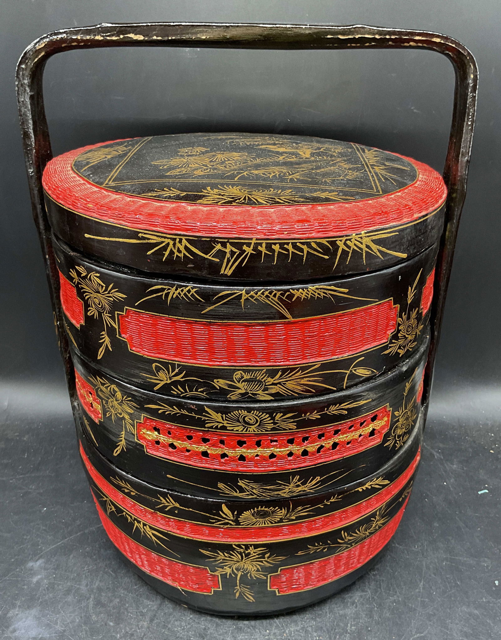Vintage Chinese Peranakan Wedding Basket: Vintage Chinese Peranakan wedding basket. Three tired basket. Hand painted lacquered wood in red and black with gilt detail. Floral and bird designs. Measures approx. 11.75 x 15 inches. Wear including
