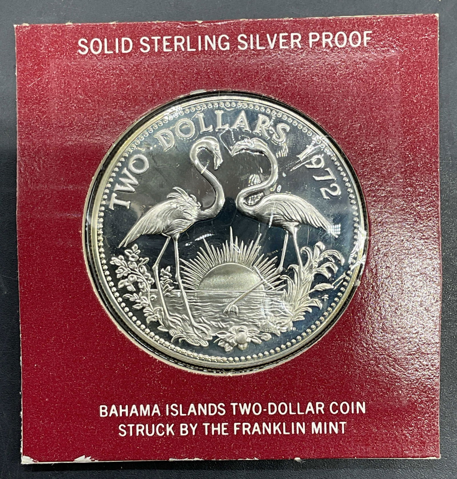 1972 Bahama Sterling Silver 2 Dollar Coin Proof: 1972 solid sterling silver Bahama Islands 2 Dollar proof coin. Struck by The Franklin Mint. Reverse features flamingos, observe features bust of Queen Elizabeth II. Measures approx 1.5 inches