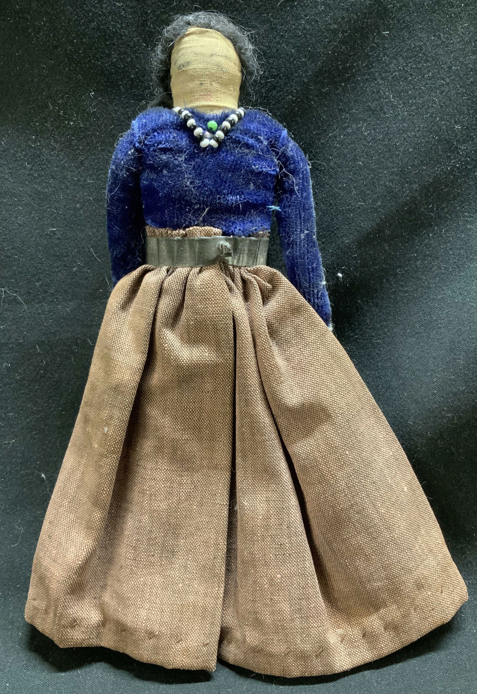 Vntg Handmade Cloth Doll Figurine: Vintage handmade cloth doll depicting a female wearing a blue velvet top & cotton skirt. Silver toned metal belt. Beaded necklace & hand painted facial features. Surface wear consistent to age, use &