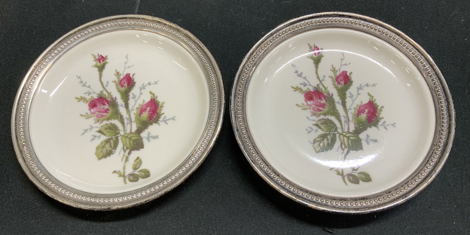 Lot 2 Vtg Rosenthal Moss Rose Sterling Dishes: Lot includes, 2 vintage Rosenthal porcelain dishes featuring a moss rose pattern with a sterling rim. Weight of both dishes: 133.1g. Signed & marked. Reads, ROSENTHAL GERMANY. STERLING. Surface wear c