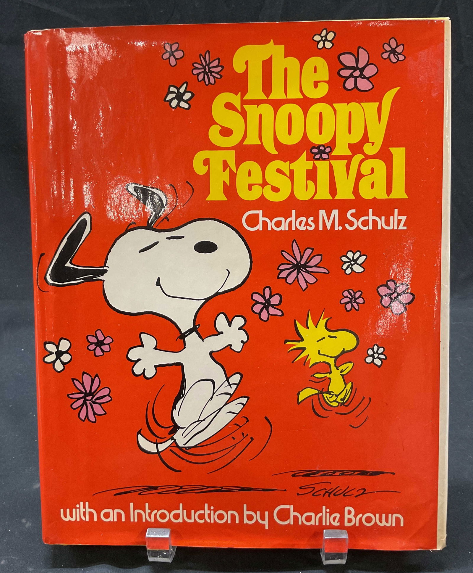 1st Ed The Snoopy Festival Illus Bk Schulz 1974: First edition The Snoopy Festival by Charles M. Schulz. Introduction by Charlie Brown. Published by Holt, Rinehart and Winston, 1974. Printed in the USA 137/037. Hard cover book with illustrated book