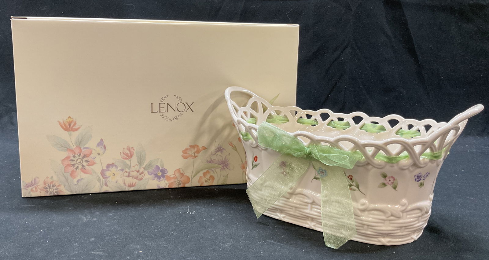Lenox Porcelain Posy Basket NIB: New in box. Lenox porcelain posy basket. Signed and marked on underside, reads as follows Posy Baskets Lenox. Comes in original box with original packaging. Oval basket shape with cut out border and h