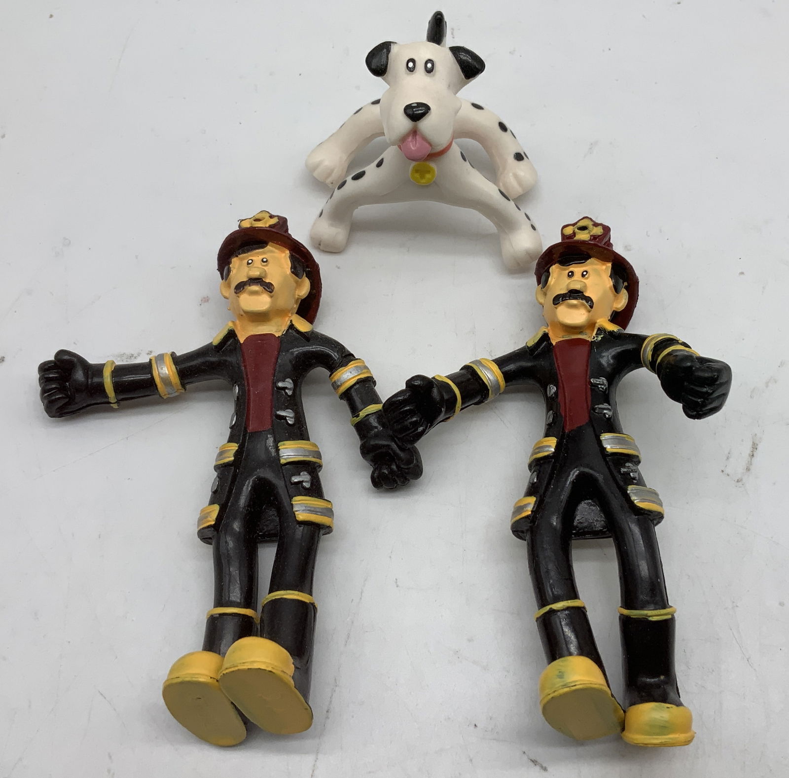 Lot 3 Kidcraft Everyday Heroes Figurines: Lot includes, 3 KidKraft Everyday Heroes figurines depicting firemans & a dog. Figs are bendable. Signed & marked. Reads, KIDCRAFT. Surface wear consistent to age, use & exposure. Property of