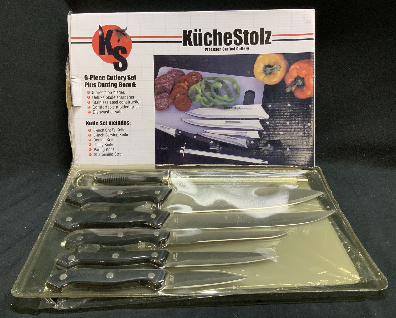 KucheStolz 6 Piece Cutlery Set W Org Box: KucheStolz 6-Piece Cutlery Set Plus Cutting Board includes five stainless steel knives and a deluxe blade sharpener. Comes with original box. Lot is sold as is. Surface wear consistent to age,