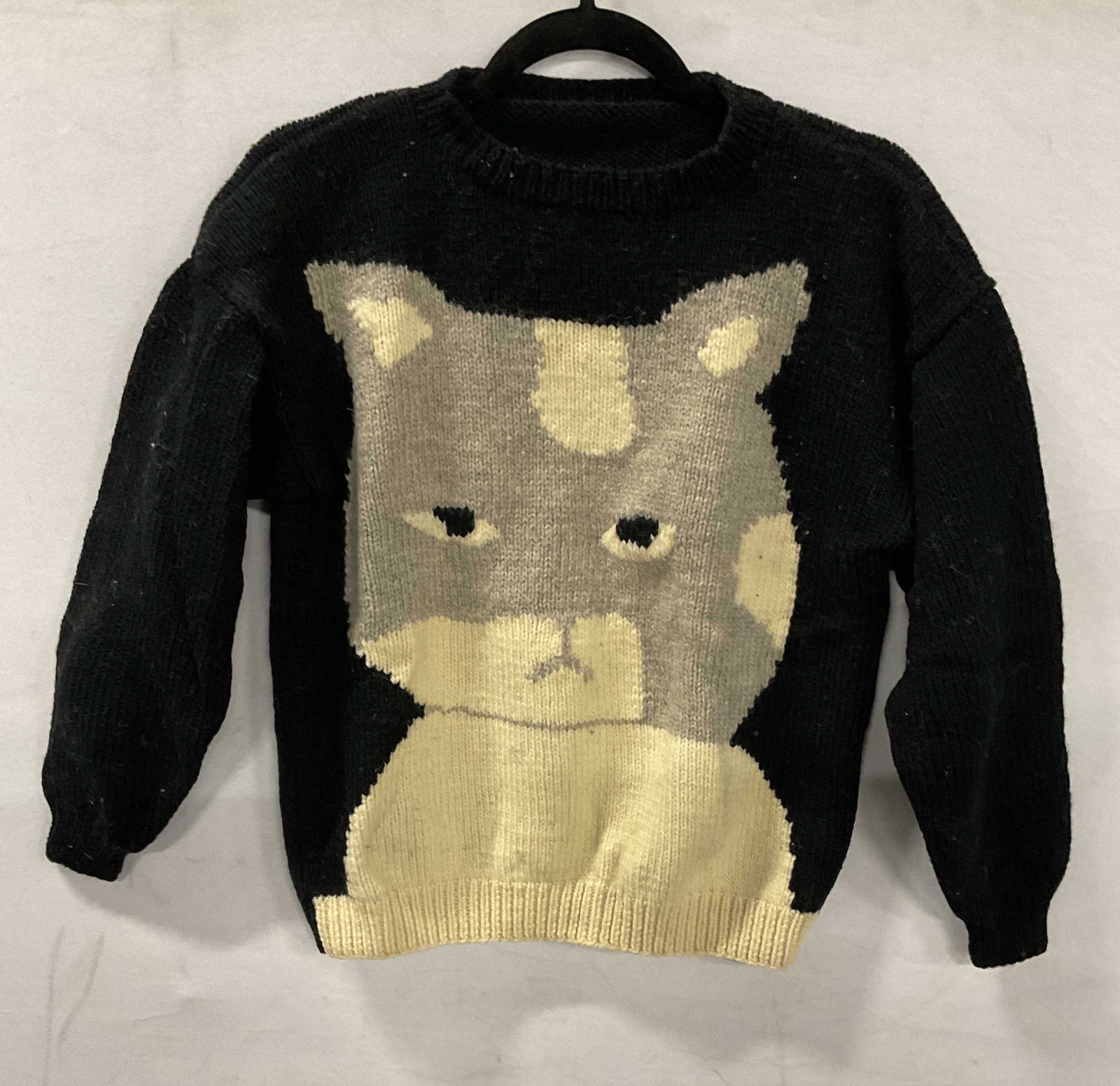 Vintage Hand Knit Wool Cat Sweater: Vintage hand knit sweater with cat face in black and white, feels like wool. Measures approx 19 inches across chest. Some wear to material consistent with age and exposure, pilling and residue. Proper