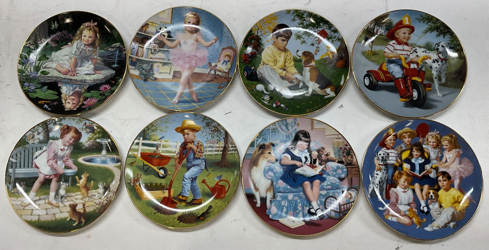 Lot 8 SGND Danbury Mint Plates Gignilliat 1991+: 8 porcelain plates. Collectible plates from the Children of the Week Collection by the Danbury Mint. Art works by Elaine Gignilliat, signed. Released in 1991. More information on underside of plates a
