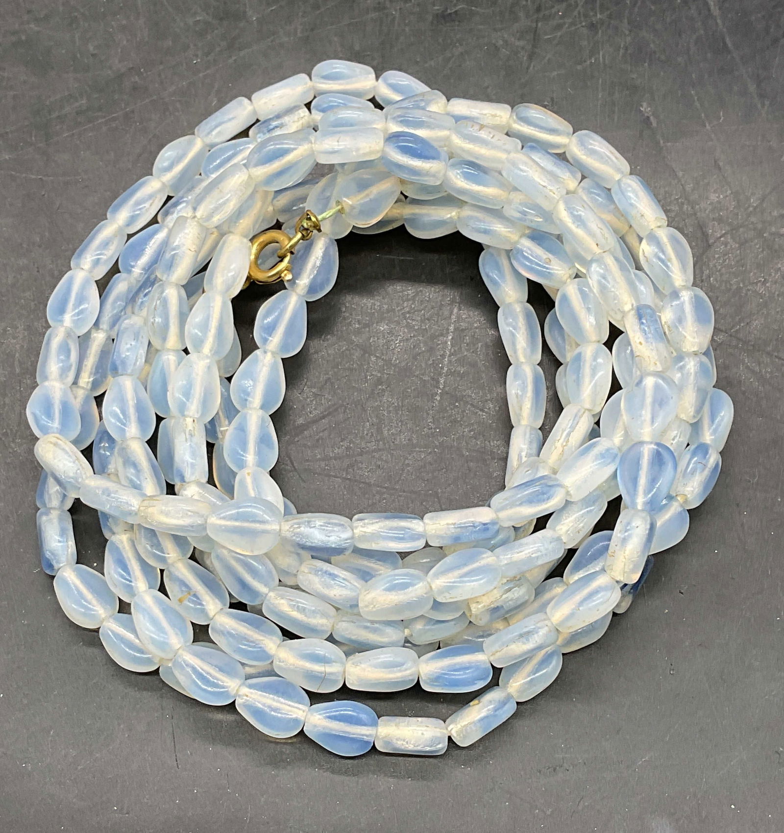 Vintage Opaline Glass Beaded Necklace: Vintage Opaline glass beaded necklace. Drop length approx 29.5 inches. Some scratching. Property of Upper East Side French stage and screen actors estate, Manhattan. Jewelry, estate jewelry, costume j