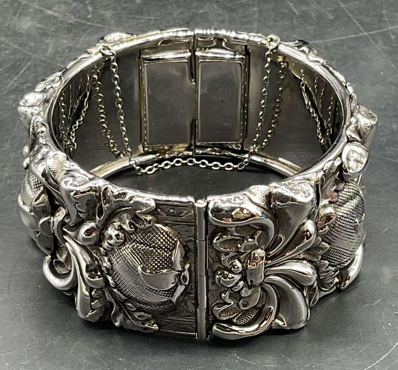 Whiting & Davis Silver Tone Scroll Bracelet: Signed Whiting and Davis Silver tone raised scroll chunky hinged bangle bracelet. Measures approx 2.25 inches wide. Some scratching. Jewelry, estate jewelry, costume jewelry, cocktail jewelry, fashion