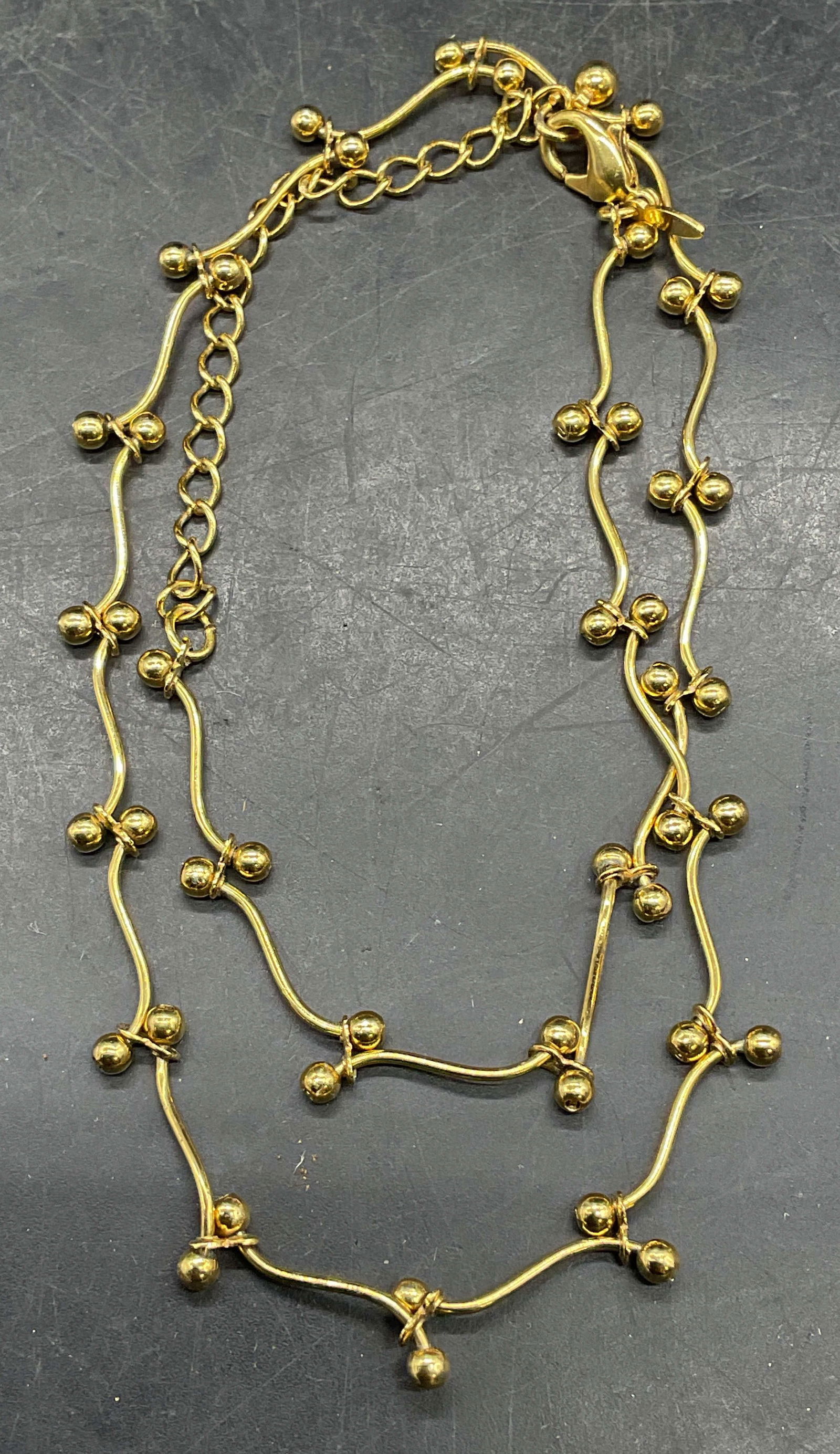 Vintage Avon Gold Tone Beaded Necklace: Vintage signed Avon gold tone beaded necklace. Drop length approx 9 inches. Some scratching. Jewelry, estate jewelry, costume jewelry, cocktail jewelry, fashion jewelry, accessories, fashion accessori