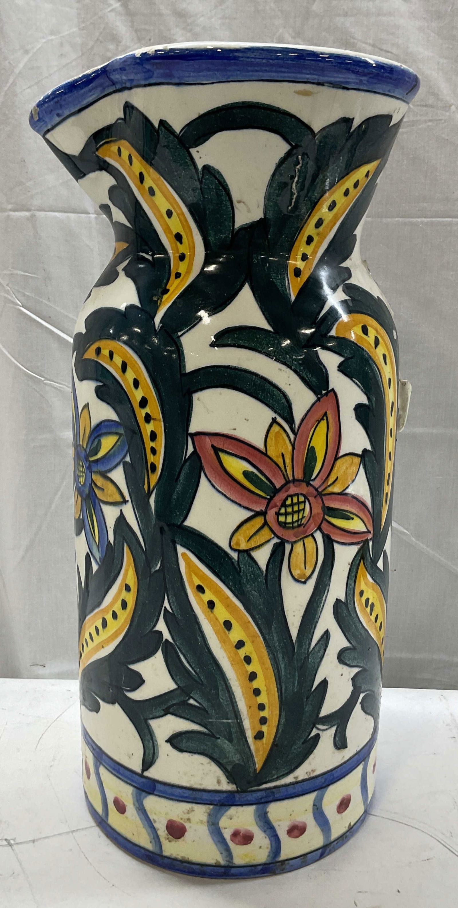 Vintage Large Hand Painted Ceramic Jug Spain 21in: Vintage large hand painted ceramic jug. Signed Spain on underside. Hand painted floral motifs. Colors consist of green, yellow, blue, pink, and more. Measures ht approx 21 inches diam approx 10 inches