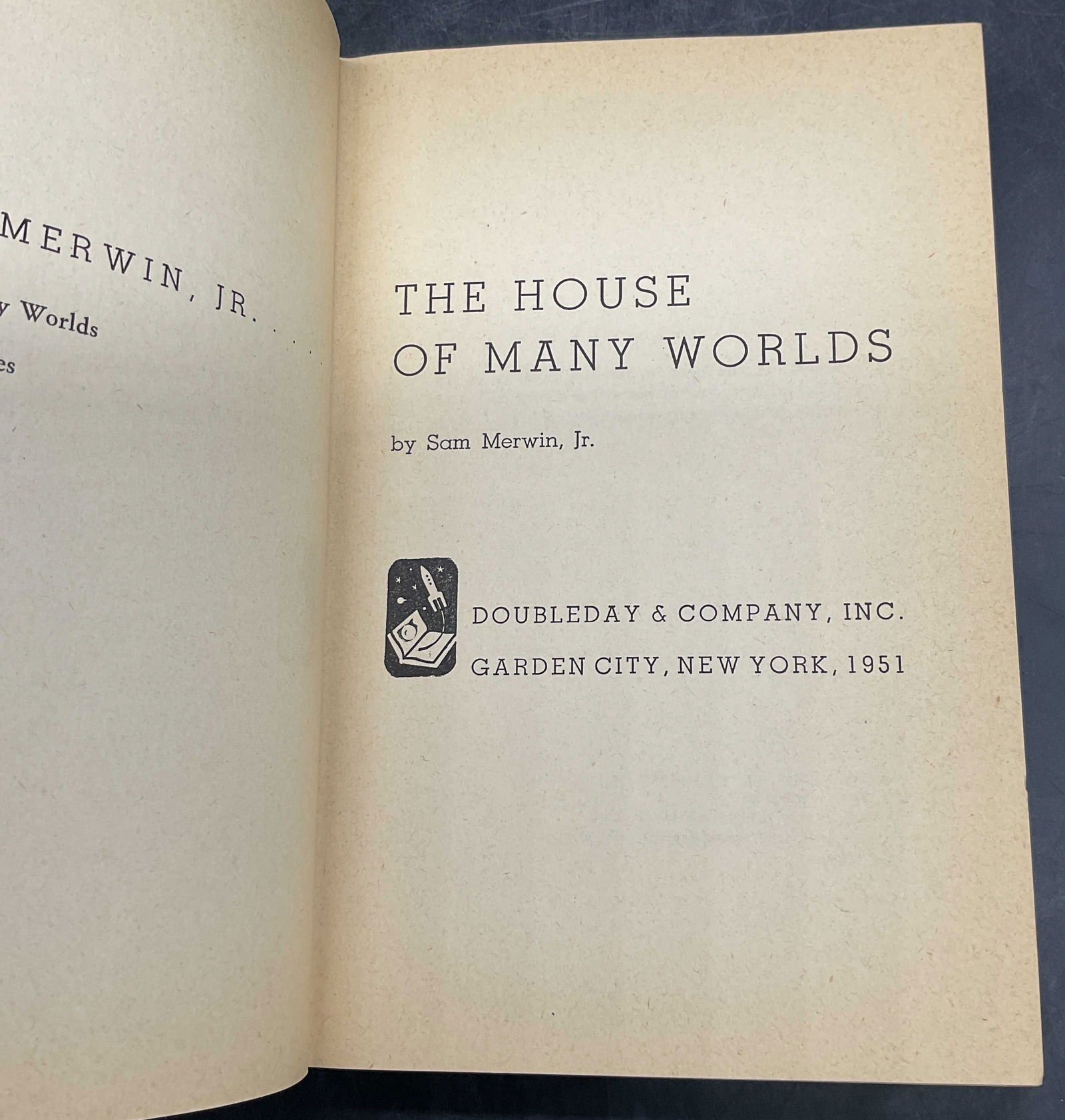 1951 Merwin House of Many Worlds 1st Edt: Hardcover first edition copy of The House of Many Worlds by Sam Merwin Jr. Doubleday, 1951. Measures approx 8 x 5.5 inches. Some wear to cover, pages, and binding consistent with exposure. Book, vinta