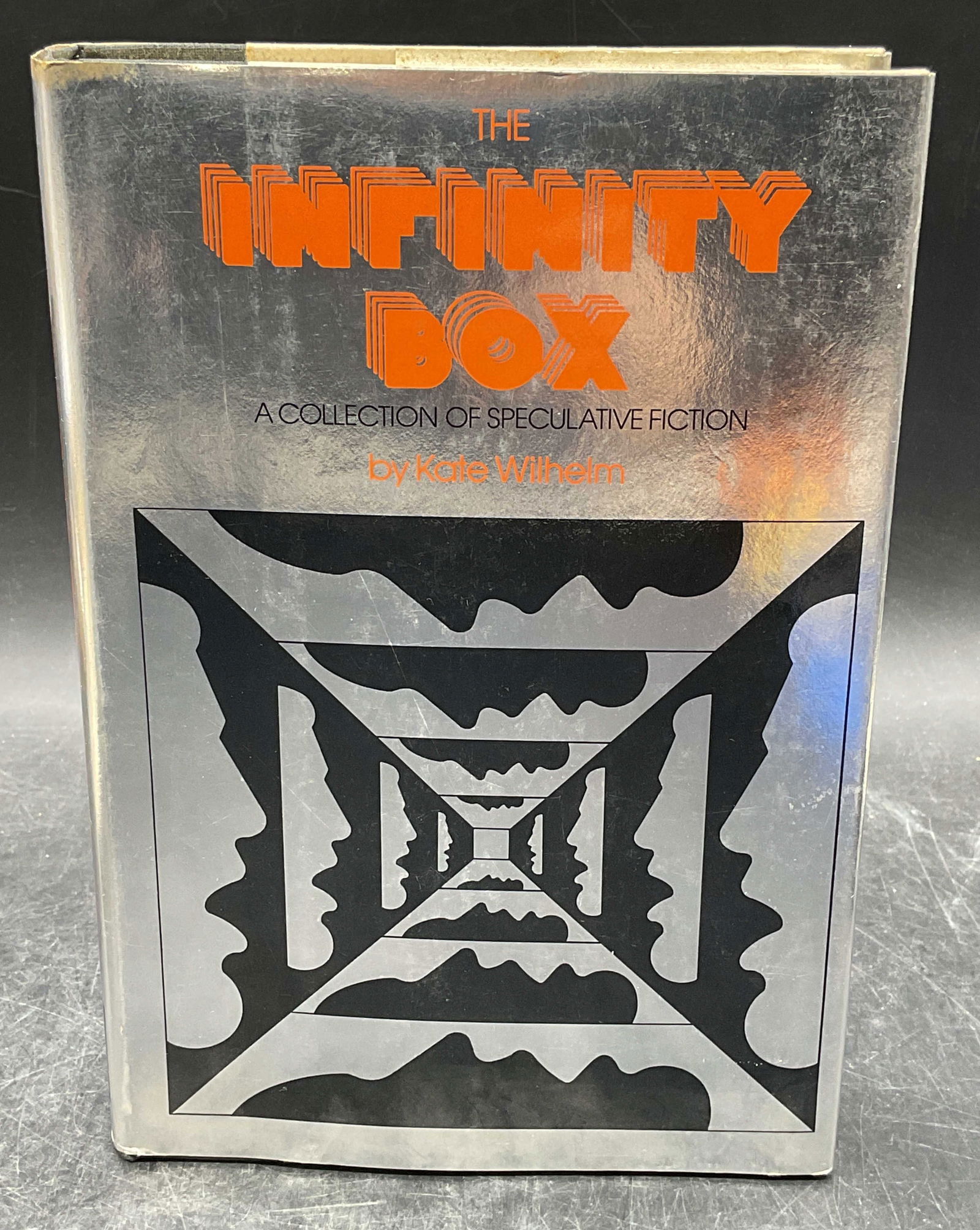 1975 Kate Wilhelm Infinity Box 1st Edition: Hardcover first edition copy of The Infinity Box by Kate Wilhelm. Harper and Row, 1975. Measures approx 8.5 x 5.75 inches. Some wear to cover, pages, and binding consistent with exposure. Book, vintag