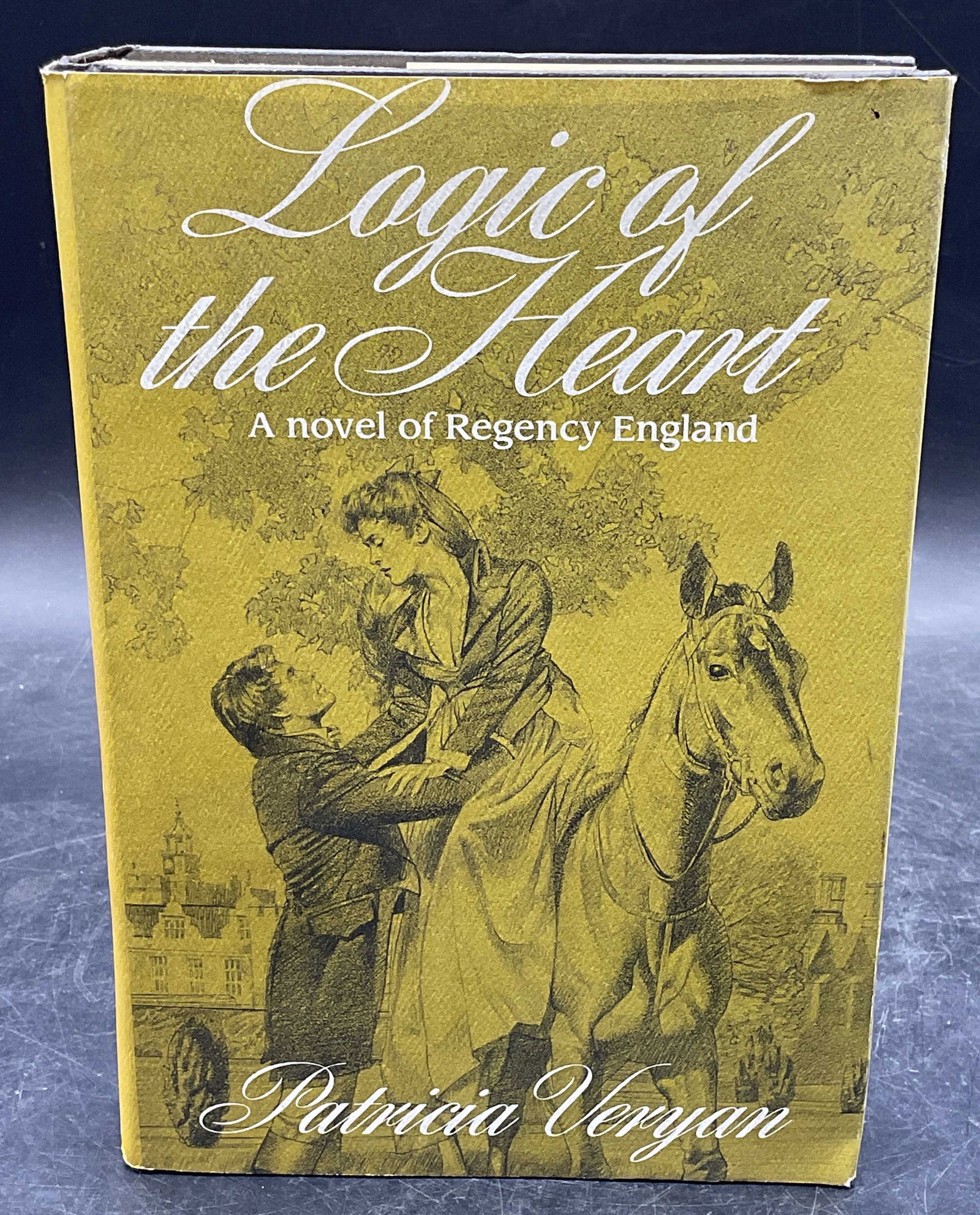 1990 Veryan Logic Of The Heart 1st Edition: Hardcover first edition copy of Logic of The Heart by Patricia Veryan. St Martins Press, 1990. Measures approx 8.5 x 5.75 inches. Some wear to cover, pages, and binding consistent with exposure. Book,