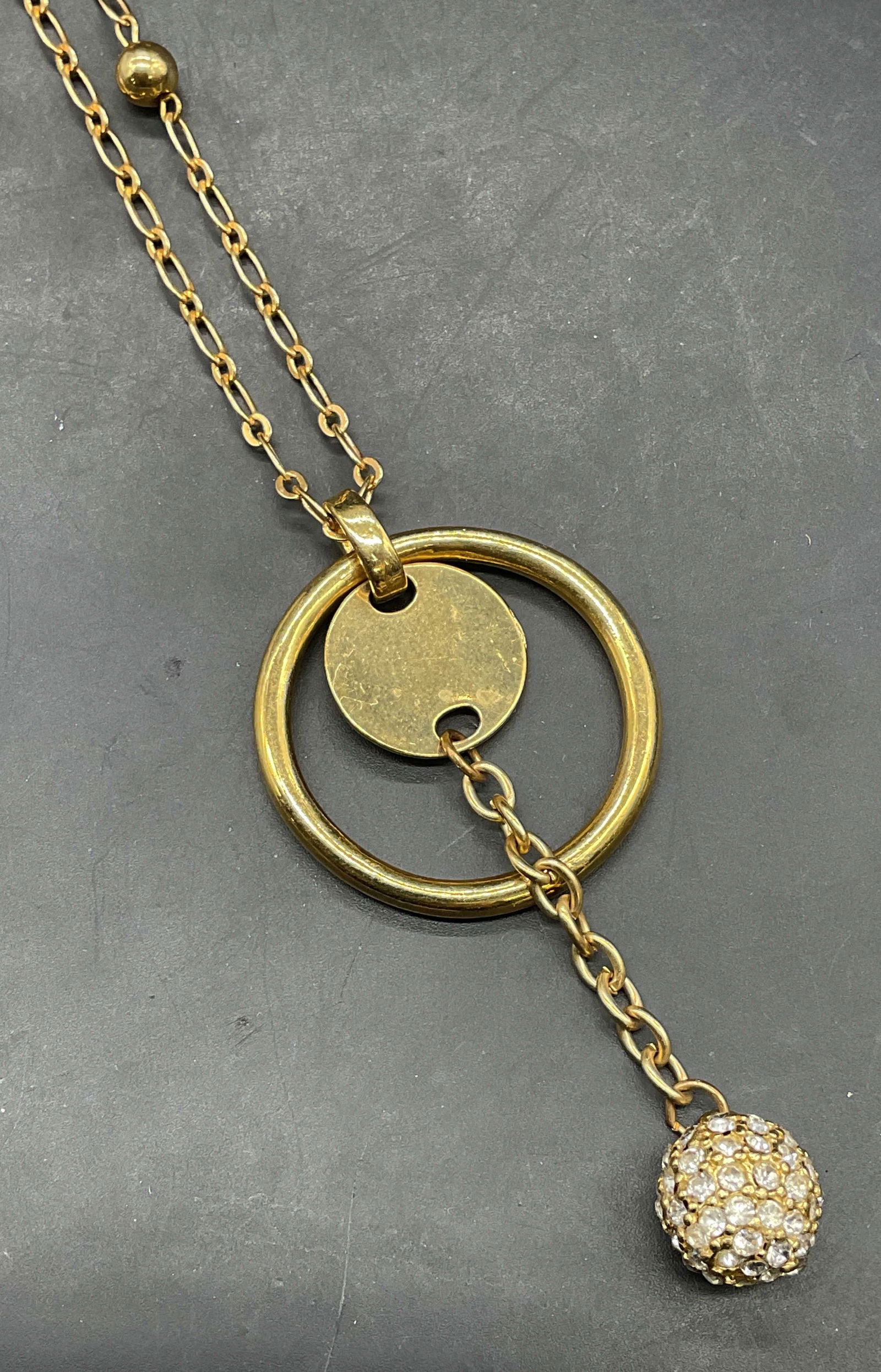 Chicos Gold Tone Crystal Pendant Necklace: Signed Chicos gold tone Crystal pendant necklace. Drop length approx 20.5 inches. Some scratching. Jewelry, estate jewelry, costume jewelry, cocktail jewelry, fashion jewelry, accessories, fashion acc