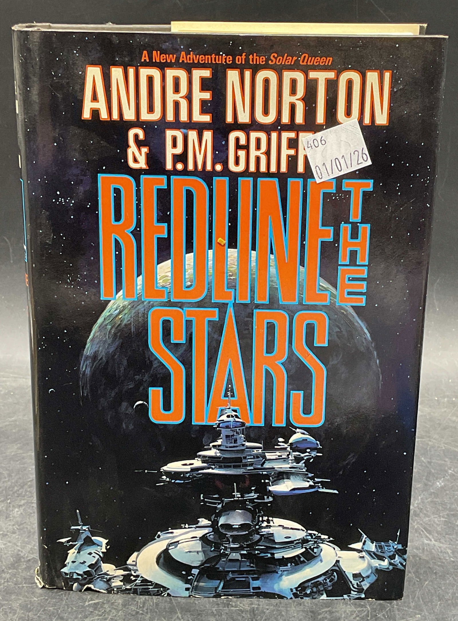 1993 Norton & Griffin Redline The Stars 1st Edt: Hardcover first edition copy of Redline The Stars by Andre Norton and p. M. Griffin. Tor, 1993. Measures approx. 8.5 x 5.75 inches. Some wear to cover, pages, and binding consistent with exposure. Boo