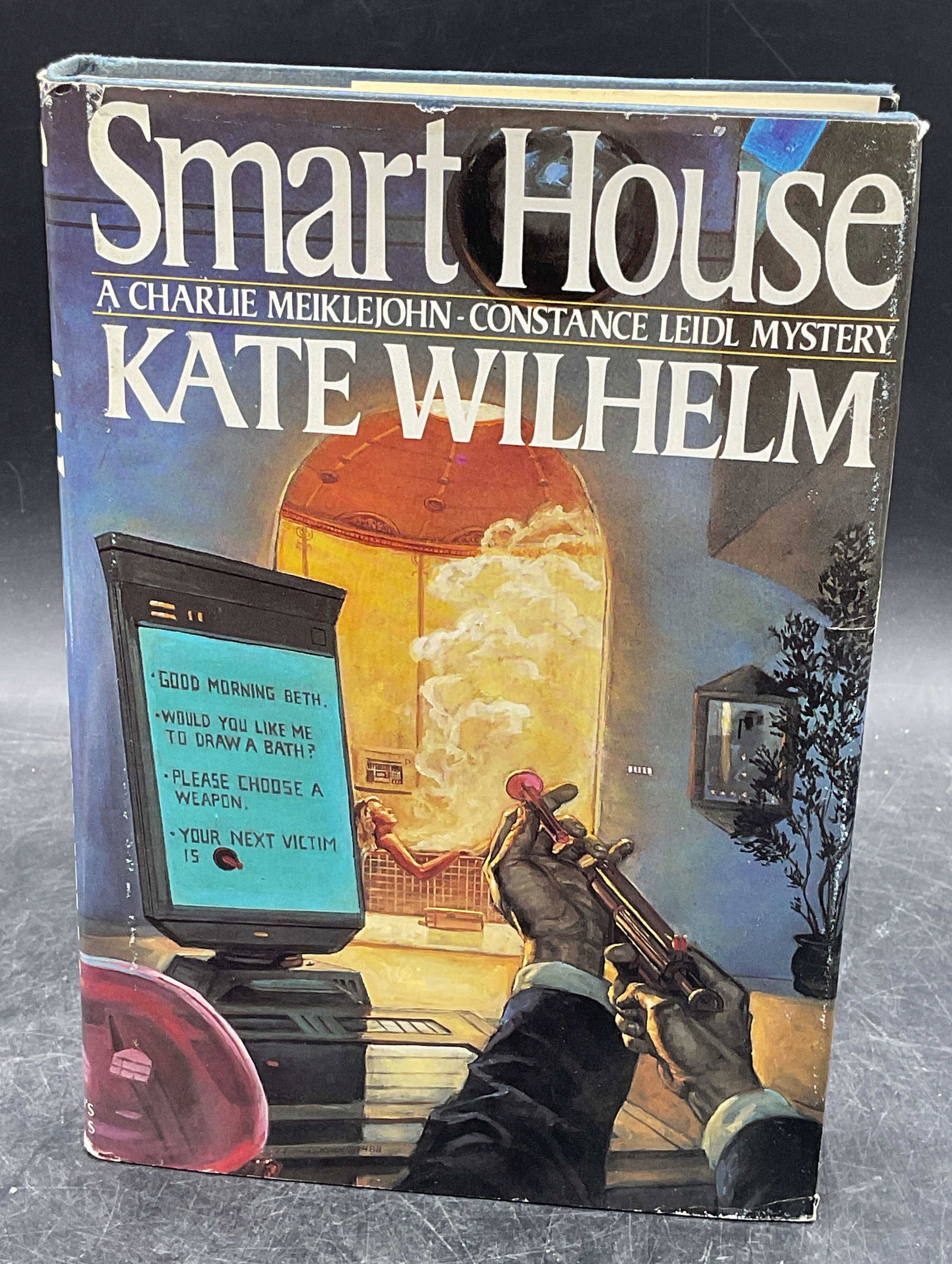 1989 Kate Wilhelm Smart House 1st Edition: Hardcover first edition copy of Smart House by Kate Wilhelm. St Martins Press, 1989. Measures approx. 8.5 x 5.75 inches. Some wear to cover, pages, and binding consistent with exposure. Book, first ed