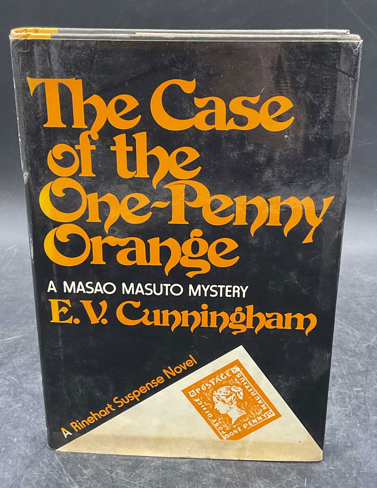 1977 Cunningham One Penny Orange 1st Edt: Hardcover first edition copy of The Case of the One Penny Orange by E. V. Cunningham. Holt, Rinehart and Winston, 1977. Measures approx. 8.25 x 5.75 inches. wear to cover, pages, and binding