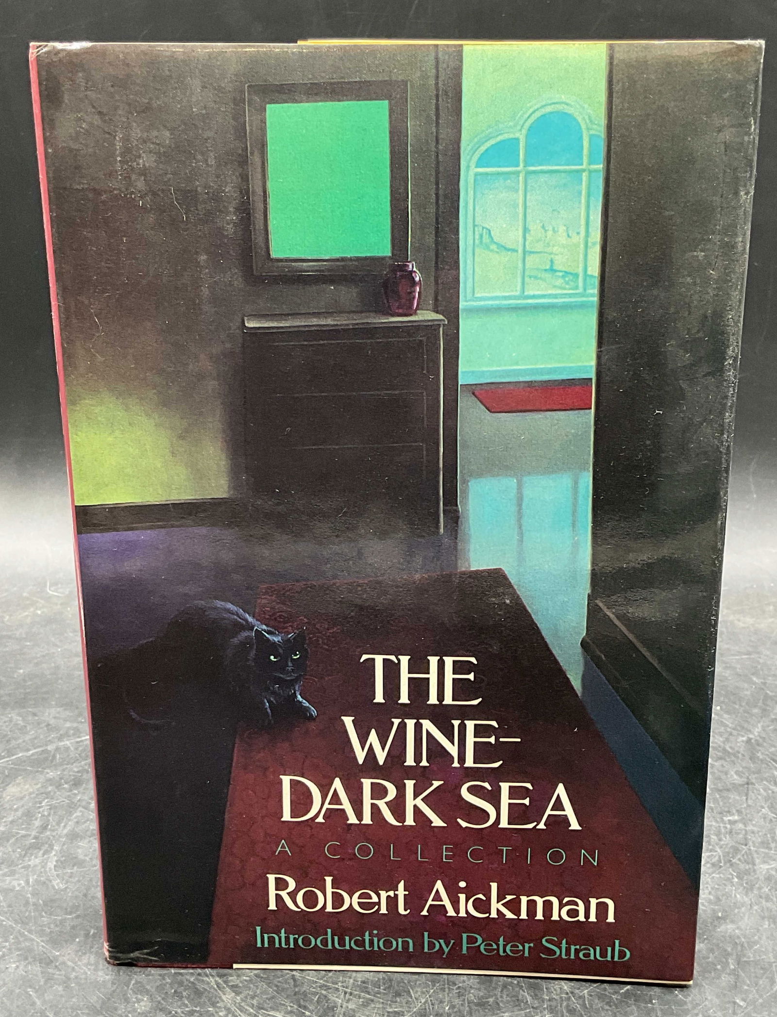 1988 Robert Aickman Wine Dark Sea 1st Edition: Hardcover first edition copy of The Wine Dark Sea by Robert Aickman. Arbor House/Morrow, 1988. Measures approx. 9.5 x 6.5 inches. wear to cover, pages, and binding consistent with exposure. Book,