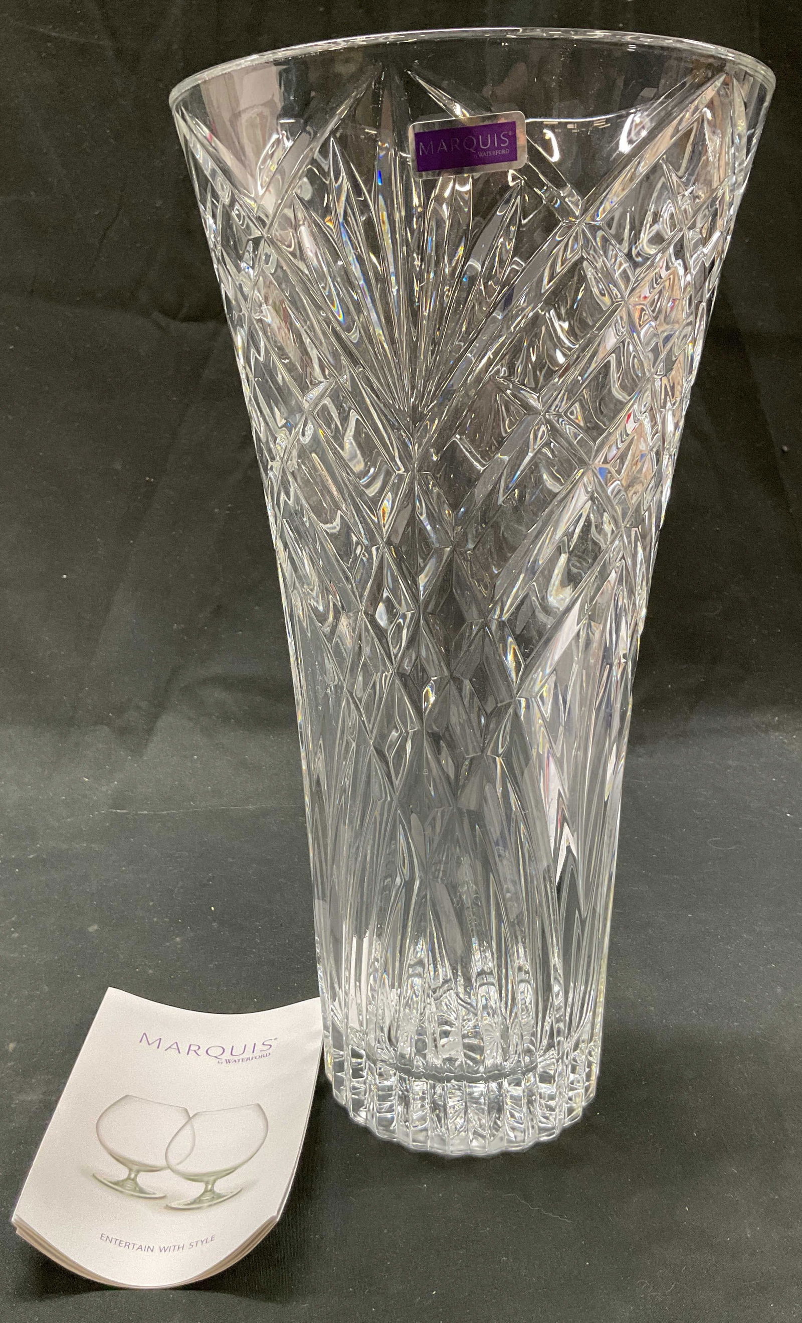 Marquis By Waterford Maximilian Crystal Vase Italy: Marquis By Waterford Maximilian crystal vase. Made in Italy. Signed on underside, reads Marquis by Waterford. Flared rim. Diamond and fan patterns. Faceted design. Starburst design on underside. Measu