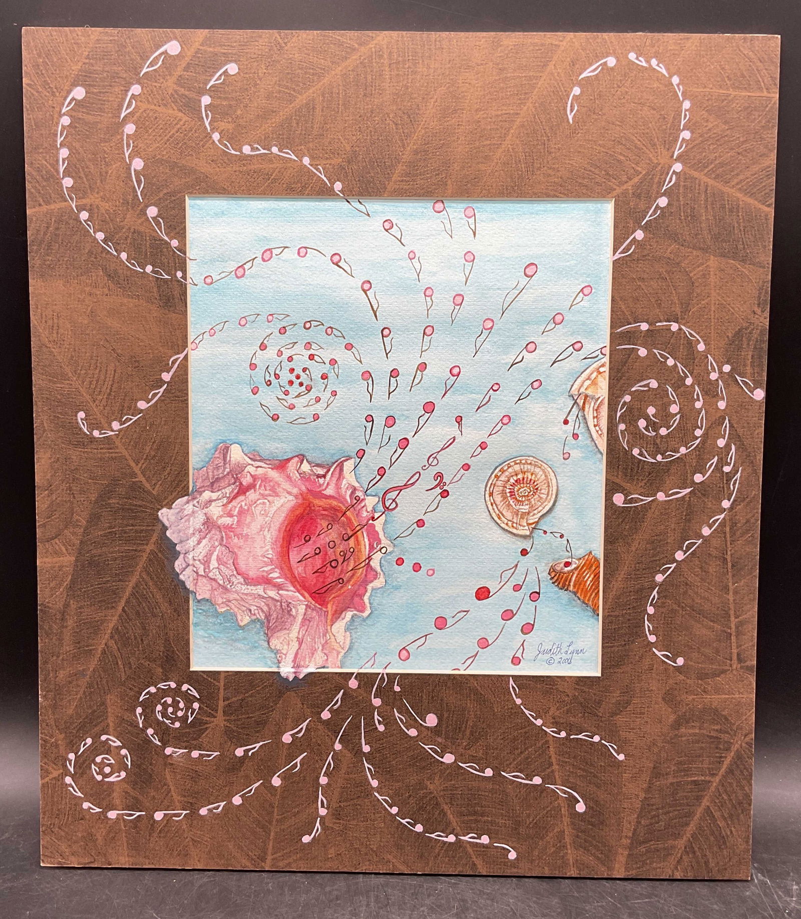 Signed Judith Lynn Sea Notes Watercolor Painting: Watercolor and acrylic painting on paper. Signed Judith Lynn. Sea Notes. Shells and music notes. Total dimensions approx 16.25 x 14 inches. Some wear consistent with exposure. Property of opera